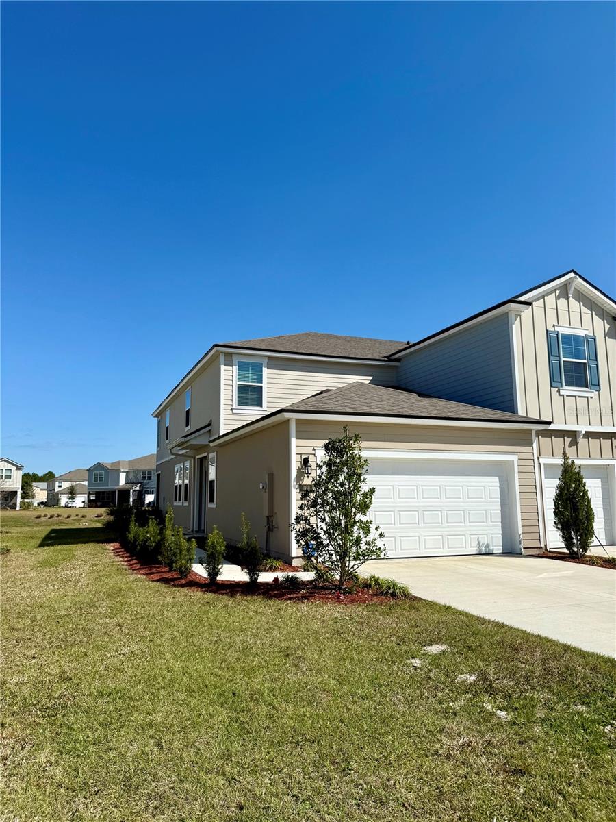 Welcome to 268 Redbud, located in the newly developed townhome community of The Trails. The Trails is nestled in the heart of Palm Coast. and conveniently located within close proximity of shopping, schools, Indian Trails sports complex, walking/biking trails and so much more. Easy access to 95 & US1. Constructed in 2024, this newer townhome features all the conveniences of single family living along with included lawn care & playground inside the gated community of The Trails. This end unit home features a downstairs area with 2 car garage, half bath, full kitchen, open living/dining room with lots of windows for light. Completing the downstairs is a screened in patio overlooking a pond. Upstairs you will find all 3 bedrooms, 2 bathrooms and a laundry room. Please contact the agent for rental criteria. 2 animals permitted under 75 lbs with pet screening.