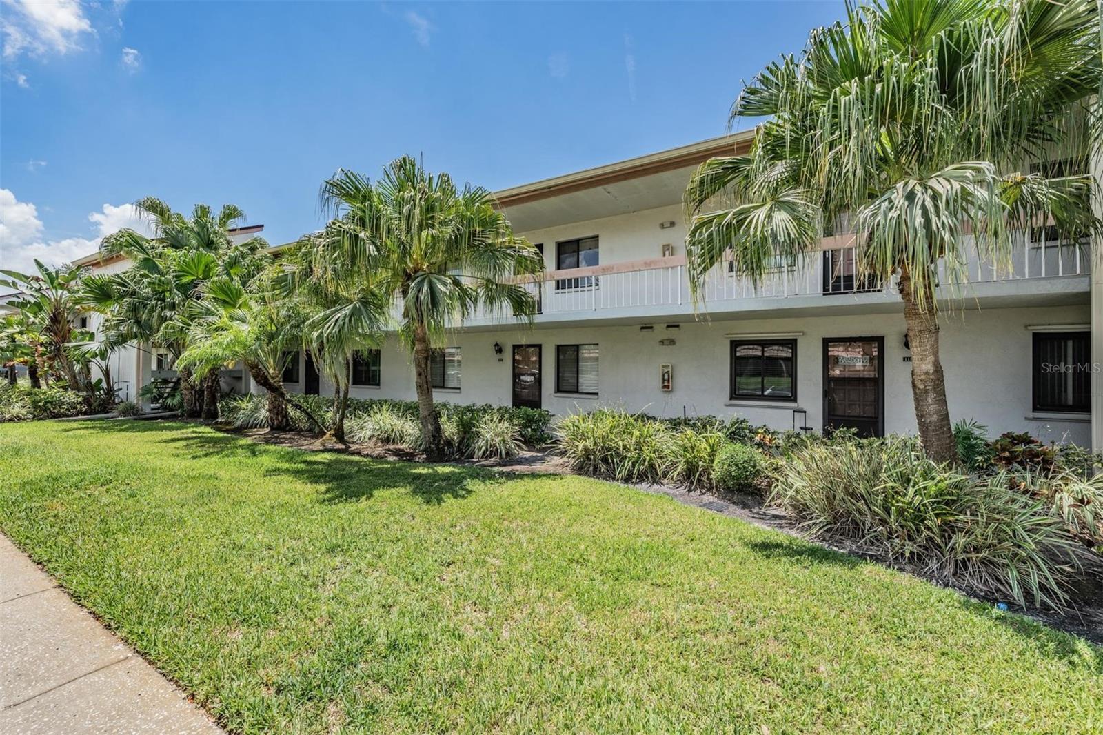 Highly valued lifestyle and amenities all waiting for you! Second floor Condo in highly sought community of East Lake Woodlands. 2 BR, 2 BA, 1,094 sq/ft living, offering an unmatched maintenance free lifestyle in one of the Tampa Bay areas finest Communities. Enjoy the pond views from the great room, owers suite and covered porch.. This home comes with new A/C unit (April 2026) and electrical improvements.  Clean, well maintained and waiting for you to make your own personal touches.  Kitchen is well proportioned with plenty of cabinet space.  Great room includes a wood burning fireplace. Maintenance free living with internet, cable, trash, water/sewer and exterior maintenance all covered with HOA fee. Included, Comnunity Pool is a short walk away.  East Lake Woodlands is a popular golf course community that offers optional golf course, fitness and social club memberships.  Gated and secured with 2 guarded entrances. East Lake Woodlands is central and convenient to many shopping options within a mile and healthcare. A short drive to Lake Tarpon, John Chestnut park, area beaches and Tampa International airport.