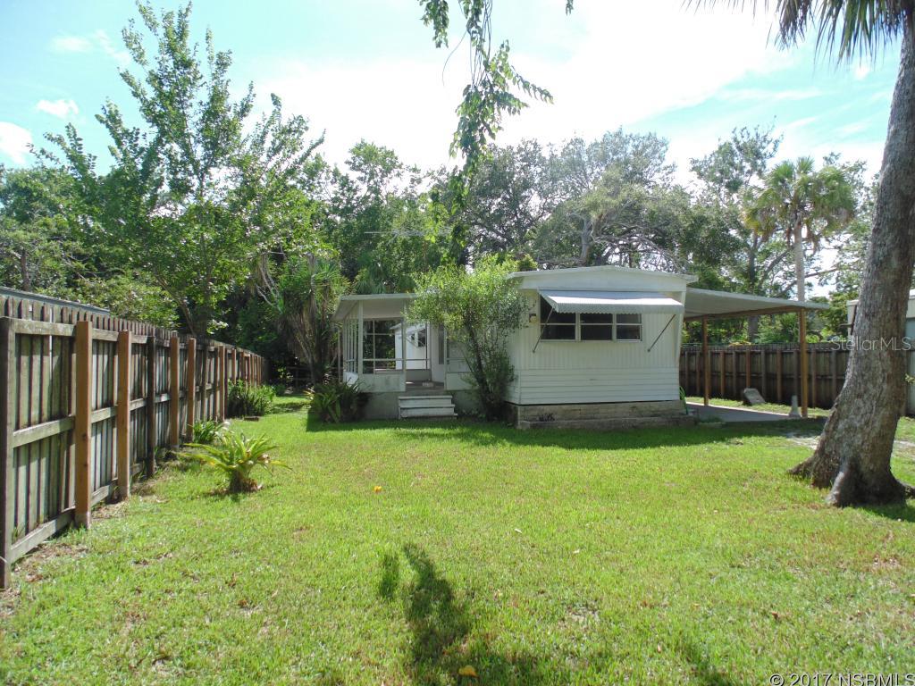Single wide mobile home on beautiful 50x150 lot.  This home just needs your TLC and it will be transformed into a perfect home or vacation getaway.  Large carport and side porch, and extra storage off of home. ;Water: City
