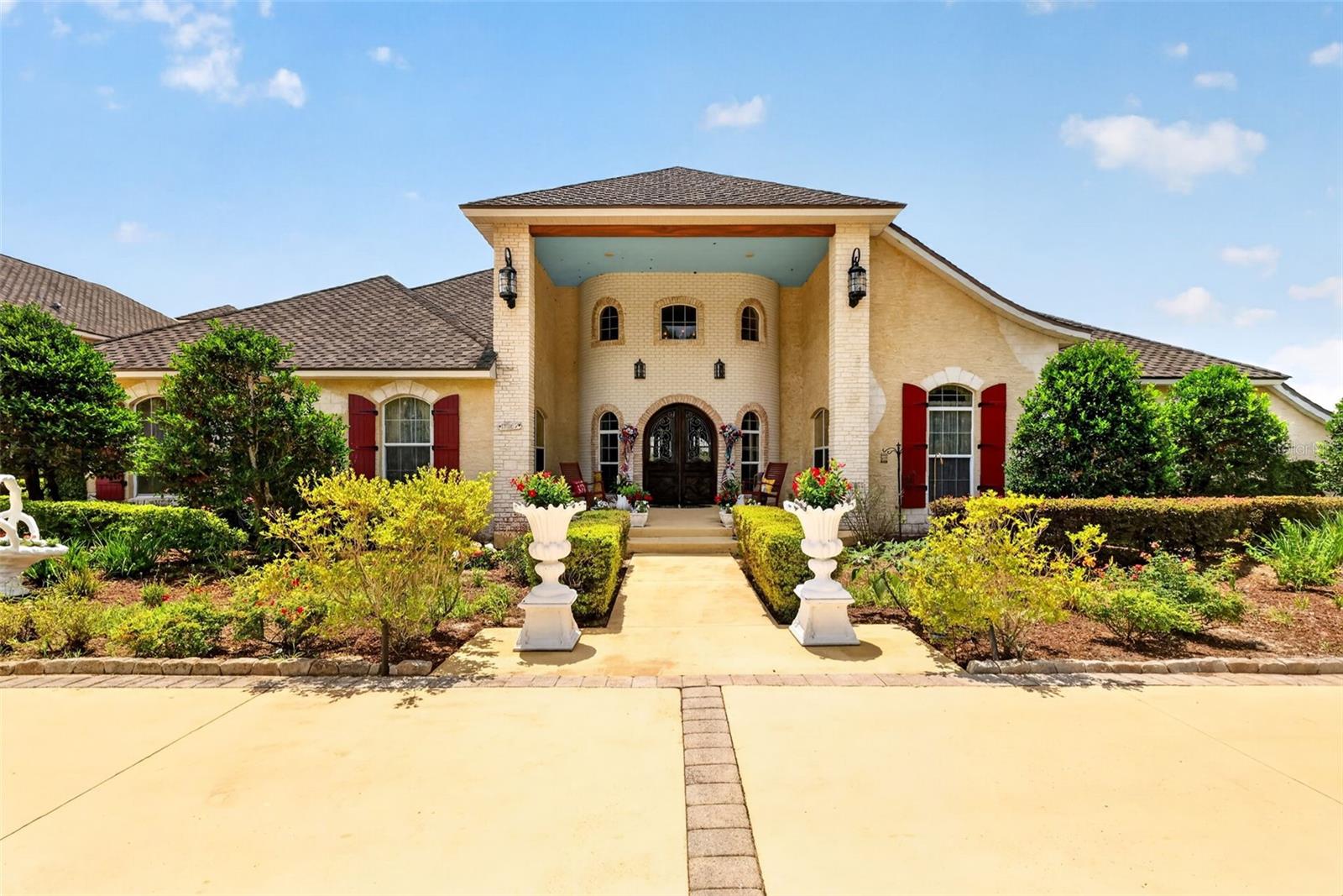 A rare Central Florida legacy estate, privately set on approximately 237 acres along beautiful Ella Lake. This extraordinary Umatilla property offers a remarkable combination of privacy, scale, waterfront beauty, and luxury improvements rarely found in today’s market. The main residence features over 11,000 square feet of living area, designed for grand entertaining and comfortable everyday living, with expansive indoor and outdoor spaces, a resort-style pool and spa, and a large, covered lanai overlooking the natural surroundings.
Beautifully positioned on Ella Lake, this private Umatilla estate offers a rare blend of lakefront living, acreage, privacy, and natural Central Florida beauty. Enjoy peaceful water views, wildlife, fishing, kayaking, paddleboarding, and the quiet outdoor lifestyle that makes this property so special. With its expansive estate setting and convenient access to Umatilla, Eustis, Mount Dora, The Villages, and surrounding Central Florida destinations, this is a rare opportunity to own a true private lakefront retreat.

In addition to the main residence, the property includes a spacious guest house of approximately 1,500 square feet situated above a six-car garage, providing ideal accommodations for guests, extended family, staff, or private retreat space. The acreage offers a stunning mix of open land, wooded areas, wetlands, and lakefront setting, creating exceptional opportunities for recreation, privacy, wildlife viewing, equestrian use, family compound living, or a one-of-a-kind luxury retreat.

Located in a quiet and highly private setting, yet within reach of Umatilla, Eustis, Mount Dora, The Villages, and Ocala, this estate is a truly unique offering for the buyer seeking space, seclusion, waterfront character, and long-term legacy value. Properties of this size and quality are increasingly difficult to find in Central Florida.