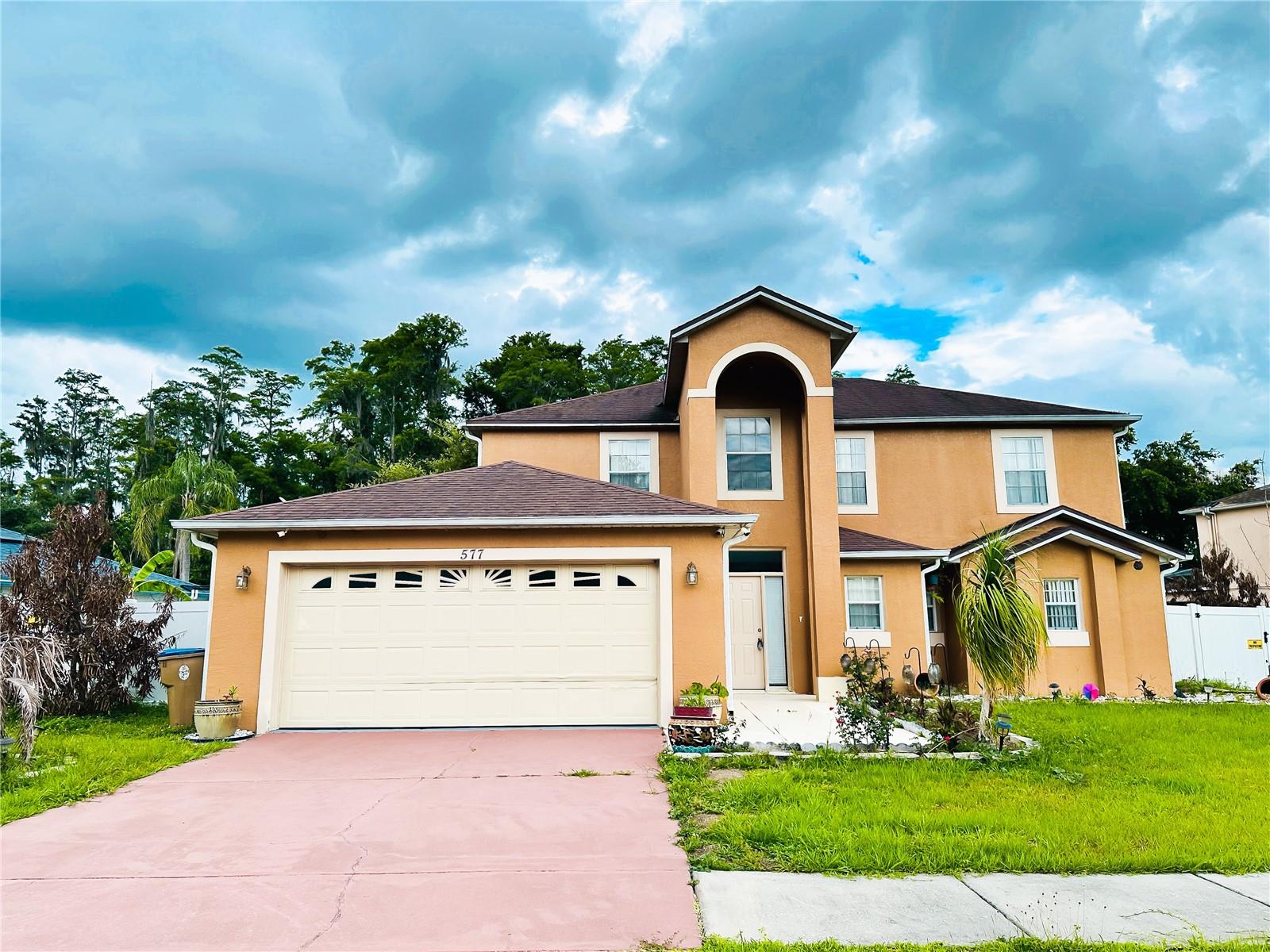 Beautiful 3/2.5 “Two Story Home” located in the established community in Poinciana in desirable subdivision “PINEHURST AT CYPRESS WOODS”. This “Cute Home” features Large Size Lot; Master Bedroom in downstairs; Tile Flooring in the main areas & carpeted bedrooms; Volume Ceilings; Open Floor Plan; Split Bedroom; Formal designated Dining area; Kitchen with solid wood Cabinets, Pantry and Breakfast Nook; Inside Laundry Room; Living Room with sliding door that leading you to rear screen enclosed lanai; Good size Family Room; Bonus Room in upstairs; Huge Fenced Backyard; and The huge backyard & covered back porch to enjoy “Florida Living”. Extra Bonus Room in upstairs could be Office, Game Room or 4th Bedroom. The Community offers Club House, Pool, Picnic Area, and Playground. A minutes away to Shopping, Schools, Banking, Super Markets (Publix, Wal Mart, etc.), Restaurants, Public Transportation, Hospital, Library, Business Centers, and Schools. All the information relating to this MLS Listing is intended to be accurate but cannot be guaranteed and must be verified by the buyer and buyer's agent. Motivated seller. NOT A SHORT SALE** NOT A BANK OWNED** OR NOT A FORECLOSURE** All Buyers Are Welcome!! Don't miss this “Great Opportunity” to buy the home of your dreams!! Opportunity knocks - ACT FAST!!! Make your appointment NOW to see this GEM!