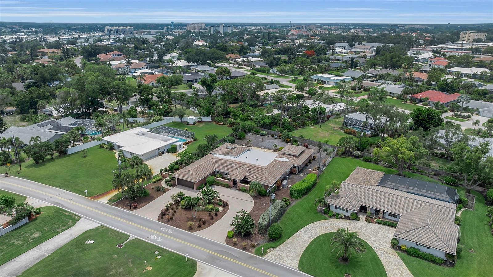 Virtually Staged. A Private Sanctuary with Bay Breezes and Endless Potential
Nestled on an oversized ½-acre+ lot, this exceptional 4-bedroom plus office, 3.5-bath residence offers nearly 4,000 square feet of thoughtfully designed living space in one of Venice Island's most desirable neighborhoods.
A charming Mediterranean-style courtyard entrance welcomes you into a home filled with warmth, character, and opportunity. Designed for comfortable living and effortless entertaining, the open floor plan features expansive gathering spaces, a dedicated office, custom cabinetry, travertine flooring, and abundant natural light throughout.
At the heart of the home, the spacious family room is framed by expansive windows overlooking the sparkling pool and private outdoor living areas. Here, soft coastal breezes and subtle views of Roberts Bay create a serene backdrop that captures the essence of Venice Island living.
Beyond its inviting living spaces, this home offers valuable updates and peace of mind, including a whole-house generator, hurricane shutters, new pool heater/chiller, new water heater, repiped sewer lines, and a newer air-conditioning system.
Whether enjoyed as it is today or transformed into a custom waterfront-inspired retreat, 609 Laguna Drive presents a rare opportunity to create your vision in a premier Venice Island location. This property has remained safe from recent storms while offering the privacy, space, and lifestyle that are increasingly difficult to find.
Where gentle bay breezes, timeless architecture, and exceptional potential come together to create something truly special.
Photos and descriptions can only tell part of the story—experience the unique setting, scale, and possibilities of 609 Laguna Drive in person.