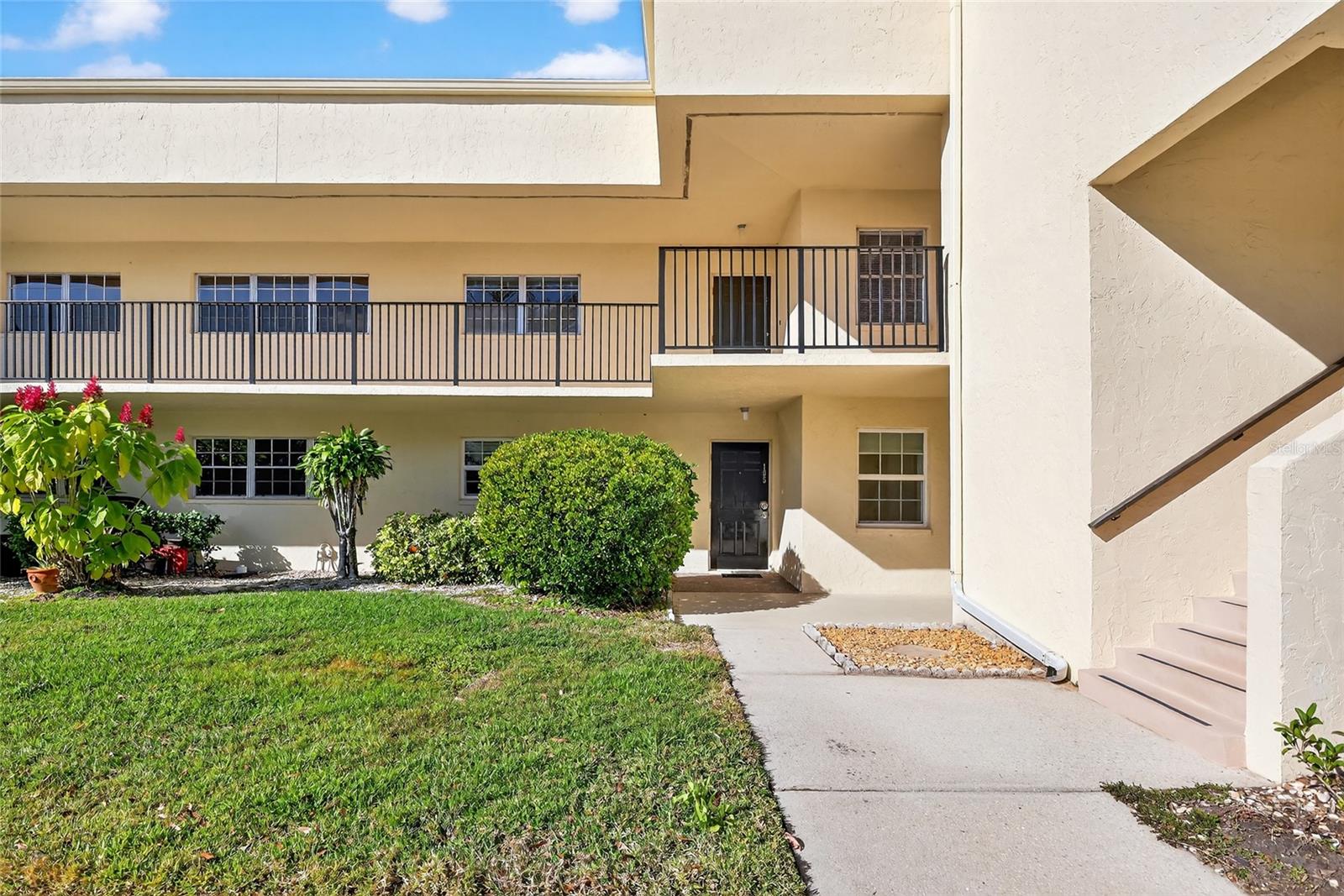REDUCED AGAIN!!!!! GREAT PRICE!!!!! Cheapest Condo In Palm Aire!!!! 
Beautiful Golf Course Views & Prime Location in Palm Aire Country Club....RARE OPPORTUNITY....
Welcome to this charming second-floor 2 bedroom, 2 bath pet friendly condo.... located in the highly desirable maintenance free Palm Aire Country Club Community. This bright and spacious 1118 sq ft. condo features an open floor concept with beautiful golf course views from the living room, dining room and bedroom, perfect for relaxation. Also there is a glass in porch to enjoy a nice cup a coffee watching the golfer in the morning or a cold glass of sweet tea in the afternoon.
Inside, you’ll find tile in the entryway , durable vinyl flooring in the living room/dining room and newer carpet in the 2 bedrooms offering both comfort and practicality. The kitchen has hardwood cabinets and newer appliances including a washer and dryer. The bathrooms have also been updated .
A MUST SEE!!!!!
Community Amenities (No Membership Required)
• Private community pool
• Shuffleboard courts
• Beautifully maintained grounds and walking areas

Optional Country Club Memberships
For the full Palm Aire lifestyle, optional membership includes access to:
• Dining
• Tennis
• Pickleball
• Golf
• Resort-style swimming pool
  Fitness Center

Conveniently located near biking trails, the UTC Mall, a variety of restaurants, the Sarasota-Bradenton Airport, I-75, and Sarasota’s world-famous beaches.
This condo offers comfort, location, and a fantastic Florida lifestyle, making it an ideal full-time home, seasonal retreat, or investment property. Some of the photos are virtually staged.