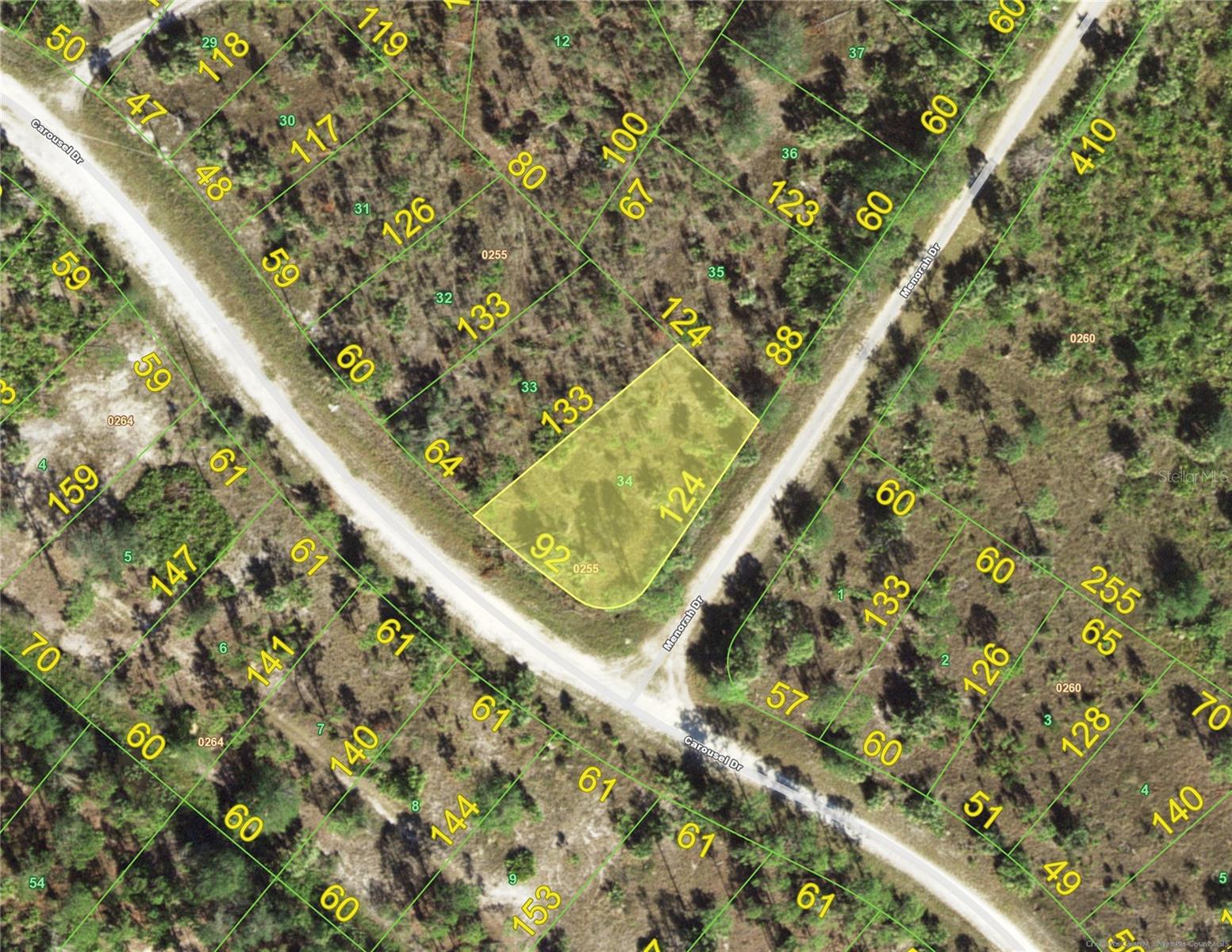 Tropical Gulf Acres residential building site located at the corner of Menorah and Carousel Drive provides a quiet “Old Florida” setting with room to build in a growing area of Punta Gorda. This growing community features a peaceful lifestyle while still being within easy driving distance of the Punta Gorda Historic District, waterfront parks, dining, shopping, and the Charlotte Harbor lifestyle. Enjoy convenient access to I-75 from Tuckers Grade, making travel north or south simple. With major growth projected nearby and national builders expanding throughout the corridor, this is an opportunity to secure land in an area positioned for future development.