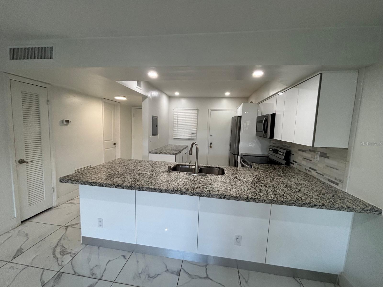 READY TO MOVE IN !!!Welcome to this spectacular fully remodeled residence, thoughtfully designed to offer the perfect blend of comfort, style, and functionality. This beautiful unit features impact-resistant windows and elegant high-quality flooring throughout, creating a modern and sophisticated living experience. The spacious primary suite includes a generous walk-in closet, while the open-concept living area flows seamlessly into a sleek contemporary kitchen equipped with stainless steel appliances — perfect for entertaining guests or enjoying everyday living.

Ideally located in the heart of Miami, this property offers convenient access to premier shopping, dining, and entertainment, including Aventura Mall, as well as easy connectivity to major highways such as Interstate 95.

A move-in-ready gem that combines modern upgrades with an unbeatable location — a must-see opportunity!