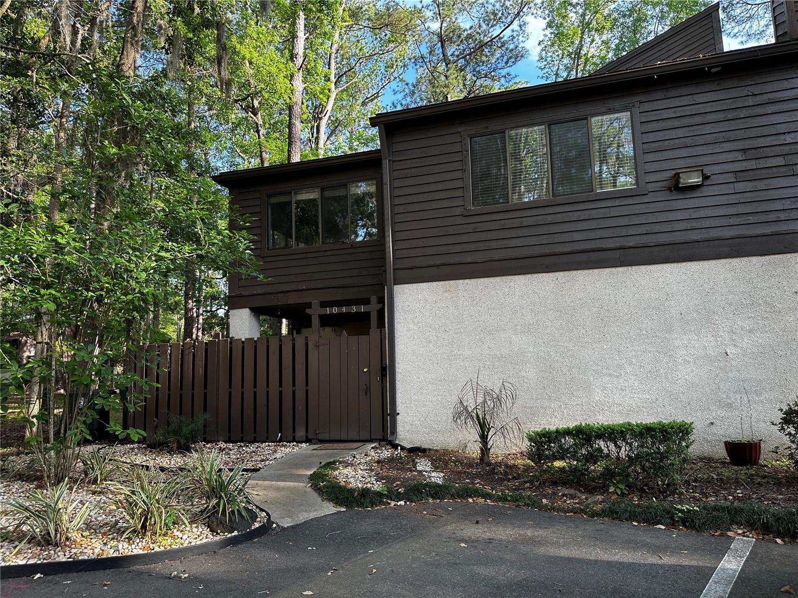 Charming 3 bedroom/2 1/2 bath unit in Townhomes of BIGTREE. Enter by your private patio. Large rooms, restored Parquet flooring, All bedrooms are upstairs. Sliders in the kitchen and the living room open to large porch for large exterior entertainment area