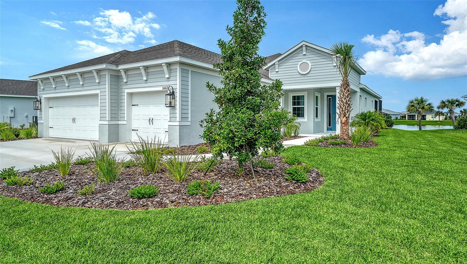 Beautiful open-concept great room home offering 2,309 square feet of thoughtfully designed living space with 3 bedrooms, 2.5 bathrooms, and stylish finishes throughout. The chef-inspired kitchen features an oversized island, premium cabinetry, and abundant space for gathering and entertaining. Peaceful water views enhance the main living areas and the spacious owner's suite. Step outside to your private outdoor retreat, complete with a sparkling pool, relaxing spa, and panoramic clear-view screen enclosure that maximizes the scenic waterfront setting. Combining comfort, elegance, and the Florida lifestyle, this home is designed for both everyday living and memorable entertaining.