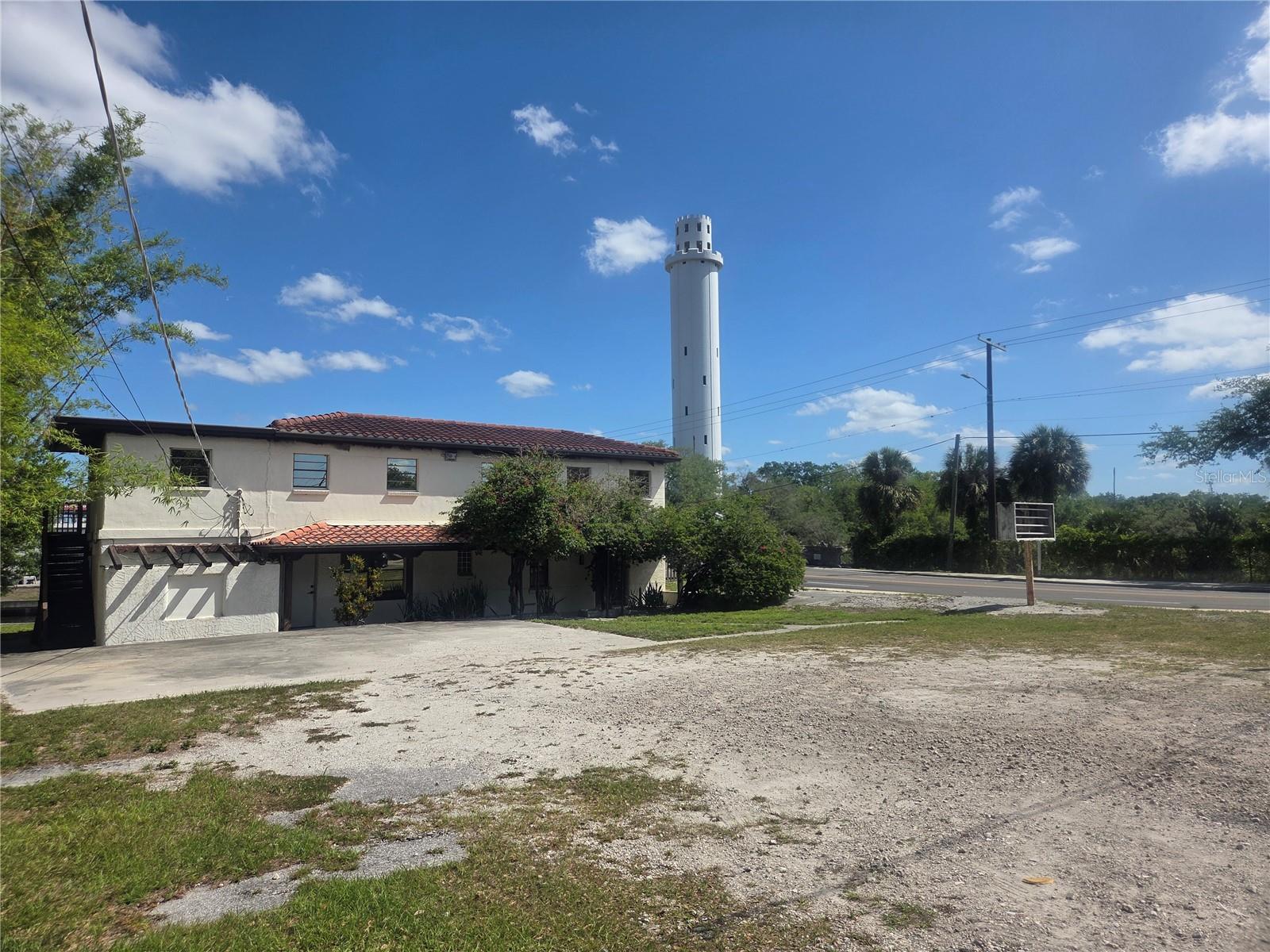 Waterfront Commercial Prime Development Opportunity in Seminole Heights... This 2404 Square Foot freestanding commercial building, currently used as a Law Office is ideally located in the shadows of the old Sulphur Springs water tower right on the Hillsborough River on the corner of the highly visible and well travelled North Florida Avenue. Asking $1,999,999... Position your business in a true urban neighborhood with eclectic dining, bungalow style homes ideal for mixed use making it a standout opportunity for developers, builders entrepreneurs or investors. Whether you're launching a new concept or expanding an existing brand, this awesome property is ready to meet your needs. Zoned SH-CI – allows for retail, restaurant, office, or mixed-use which promotes intensive commercial development allowing for wide range of retail, professional offices and commercial services which are part of the Seminole Overlay District, which ensure compatible with with historic context in terms of design, simply allows for density and intense business operations. Allows for building heights up to 4 stories, focusing on commercial mixed use supporting a blend of retail and office on the ground floor with residential units above. With over  85 feet of Hillsborough River frontage and a depth of 116 feet deep one could combine it with the property next door at 103 Stanley MLS #TB8497603 currently listed at $450k which is also zoned SH C-1 with 80 feet of river frontage and 151 feet deep which would be over 165 feet of Hillsborough River frontage and 21,000 square feet to build up where the possibilities are endless. Quick access to I-275 and Downtown Tampa and just minutes to popular downtown Tampa sites like Armature Works, Amalie Arena, the Channel District, Riverwalk, Straz Performing Arts Center, Raymond James Stadium,  Busch Gardens and the Lowery Park Zoo. Surrounded by popular dining spots, boutique shops, and thriving local businesses, high visibility, walkability, and location  make this riverfront opportunity in one of Tampa’s most desirable neighborhoods