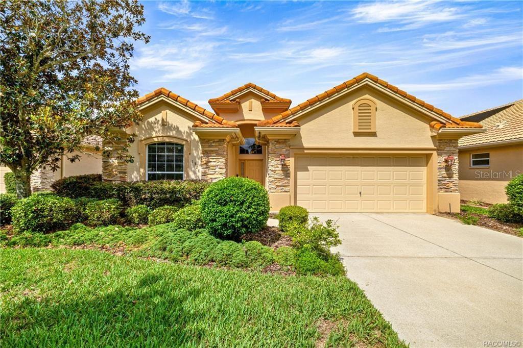 Virtually Staged. YOU DO NOT WANT TO MISS THIS INCREDIBLE SAVINGS on this Beautiful Water View Home! Imagine Waking up every day to the serene sound of a fountain on Sam Tamposi’s Lake, with panoramic views of the #2 Hole at the prestigious Skyview Golf Course, YOU CAN. This home is one of fewer than 38 homes that enjoy this exceptional waterfront setting—making it truly rare and highly desirable. Step inside this bright and beautifully maintained Windward-style home, ideally positioned with SOUTHERN EXPOSURE to maximize natural light and highlight the stunning water views framed by seasonal wildflowers. All located in the amenity rich Resort Style Gated Community of Terra Vista in Citrus Hills. Boasting 3 spacious Bedrooms, one additional Bedroom/Office with French Doors, 2.5 bathrooms, and a rare, oversized pantry/utility room, this home delivers both comfort and convenience. The tile flooring glistens under the sun, while the fresh paint, 2022 HVAC system, and a recently inspected/repaired roof ensure peace of mind from the moment you move in. A private glass-paneled Office/Bedroom with French doors provides the perfect space to work or unwind, just across from a versatile formal dining area—also ideal as a game room or second lounge. The 23' master retreat is a true haven with room to spare, offering privacy and tranquility thanks to the well-designed split floor plan. The heart of the home—a chef-inspired kitchen with solid surface countertops and stainless-steel appliances—flows effortlessly into the open living area, featuring an alcove perfect for your entertainment setup. Everywhere you turn, you're drawn to the incredible water and golf course views. Step outside to the expansive 24' x 14'9" screened lanai, ideal for morning coffee, evening cocktails, or future plans for a custom pool. There's even plenty of room in the oversized garage (22’11” x 19’8”) for both your vehicles and a golf cart! Some photos are virtually staged. Life in Citrus Hills is wonderful making friends and dancing at the Tiki Bar, enjoying the three restaurants, playing pickleball, golf and tennis. Need a workout, the Fitness Center and Spa is truly a delight. Or maybe a lounging at the pool, or cycling in the community, walking your dog at the dog park. It here! Want to join clubs, there are many - What a wonderful way to make new friends and enjoy life with your Citrus Hills Social Membership!
