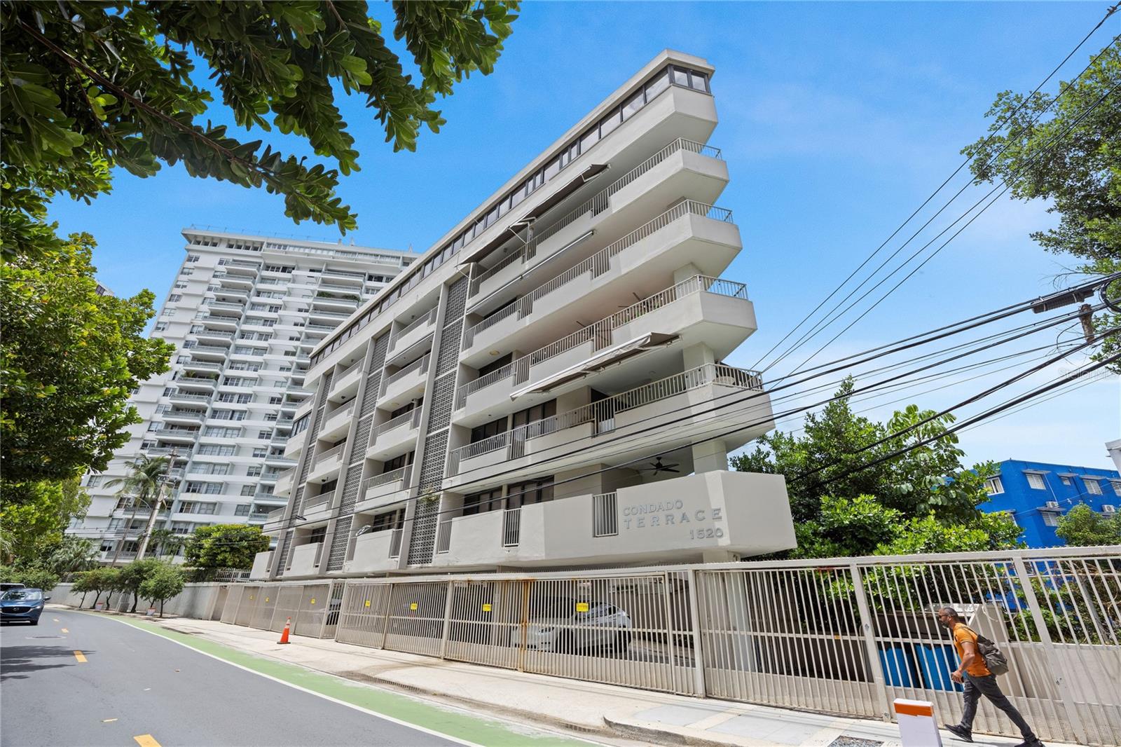 Positioned along iconic Ashford Avenue at Condado Terrace, this residence offers a rare balance of vibrant city living and a relaxed beachfront lifestyle. Ideally located between Condado and Ocean Park, it sits within one of San Juan’s most desirable coastal corridors. Just across the street, miles of uninterrupted sandy beach set the tone for daily walks, ocean swims, and effortless access to the water.

The residence enjoys an ocean view from a beautiful terrace and a seamless indoor-outdoor flow. Spanning approximately 3,060 square feet, the apartment features an open-concept living, kitchen, and dining area, along with 3 bedrooms and 3.5 bathrooms. The layout is thoughtfully distributed to maximize comfort and privacy. Apartment includes 5 inverter A/C units, and 6 ceiling fans. The full kitchen is equipped with a refrigerator, dishwasher, stovetop, and a versatile oven suite including both conventional and microwave/convection options. A private terrace extends the living space and includes a BBQ area, creating an inviting setting for outdoor dining and entertaining.

The home is supported by a water cistern and a full backup generator with an oversized 600-gallon fuel tank that powers the entire apartment. This full-floor residence includes 2 covered parking spaces and offers a level of privacy that is increasingly rare. The property is offered unfurnished, and all artwork and personal items will be removed prior to closing.

Condado Terrace, built in 1965, is a boutique six-floor condominium that reflects the mid-century transformation of Ashford Avenue into San Juan’s “Golden Strip.” Designed in a tropical modern style, the building emphasizes cross-ventilation and indoor-outdoor living. The triangle-shaped structure utilizes reinforced concrete, providing durability against the coastal environment. With only nine residences in total, it offers a private, low-density alternative to larger towers. This is a premier opportunity for a primary residence, second home, or investment in a prime Ashford Avenue location.