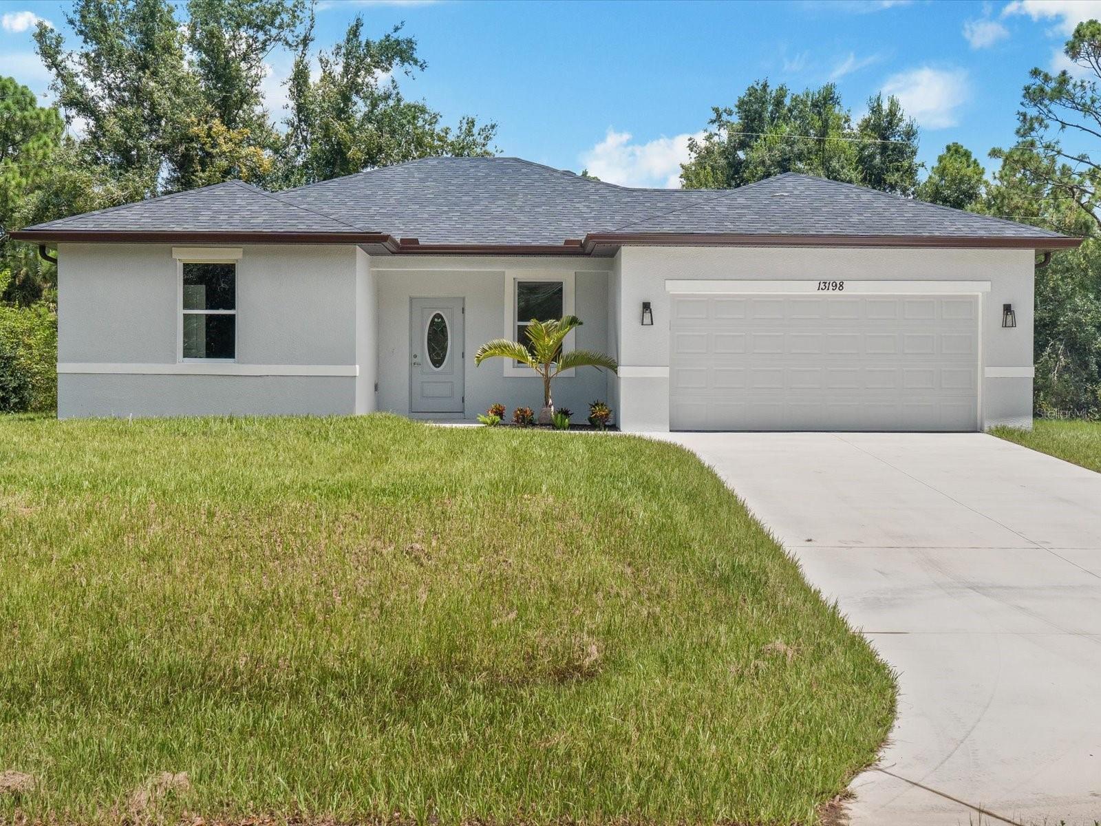 Large Price Reduction!!!  Seller motivated!!! Introducing The Cove, have 15-20 years of worry-free maintenance buying brand new and being pampered with the state-of-the-art items such as beautiful high level Granite countertops, 42" solid wood cabinetry with soft close doors & drawers, Stainless Steel refrigerator, dishwasher, range, & microwave, upgraded high-end lighting including ceiling fans with light kits in ALL bedrooms & family room plus an abundant amount of recessed lights, allergen-free porcelain plank flooring throughout, walk-in closets in EVERY bedroom, soaring 9'4" high ceilings throughout, 5 1/4" baseboards, fully tiled bathtub walls and walk-in shower...no plastic inserts here! Live in extravagance without spending a fortune! Built to current building codes and beyond, this home will provide a lifetime of ease with hurricane IMPACT WINDOWS, doors, and sliders, never put up a shutter and enjoy low cost Home Owner's insurance as New construction is the least expensive to insure plus this home IS NOT in a flood zone, so no flood insurance needed! Not in an HOA, bring your boat, RV, & toys! You can still add a pool through the builder for $60,000. Other locations available, some with larger 4 bedroom floor plans. Pictures of different location but same floorplan, colors, lighting choices, flooring, granite may differ. Call for your private showing today!