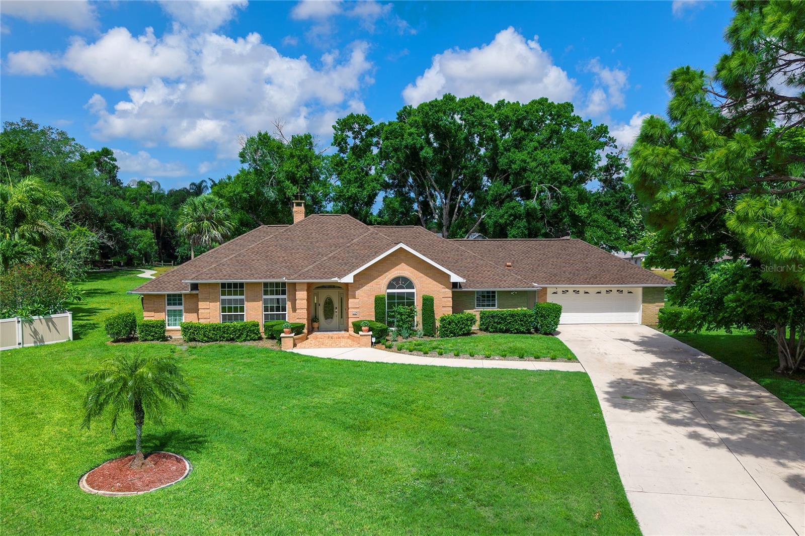 Welcome to 4908 Taywater Dell, an impeccable single-family home located on an oversized quiet Cul-De-Sac lot in the highly desirable Meadows Community. This grand residence features 3 bedrooms, 2.5 elegant baths, a designated home office, and a versatile den, which can easily be transformed to suit your needs. Thoughtfully reimagined from the ground up, this home delivers an unmatched level of craftsmanship and refined living. Every detail has been carefully curated - from the premium COREtec LVP flooring and solid hardwood baseboards to the beautifully restored ceiling trim - all anchored by a classic wood burning fireplace that brings warmth and character to the heart of the home. 
Once you step into the exceptional gourmet kitchen, you will never want to leave. Generous in size and rich in detail, it delivers on every level. Soft tonal cabinetry, stunning quartz countertops, a classic cast iron farmhouse sink, and a striking marble backsplash set the tone for premium Bosch appliances, an induction cooktop and double wall ovens . A custom cabinetry station with integrated charging and a built-in pantry with roll-out shelving make this kitchen as practical as it is beautiful. Seamlessly connected, the adjacent bar area - with its own quartz countertops and custom white oak shelving - is tailor made for gathering and entertaining with warmth and style.
The primary bath feels like a true retreat — a cast iron soaking tub, custom white oak vanity, and Kohler rain shower ground the room in luxury, while large-format tiles, minimal grout lines, and a tankless water heater add refinement and practicality in equal measure. A generously sized  walk-in closet is outfitted with a custom white oak modular system, beautifully crafted and wrapped in warm, natural elegance. Outside, the private pool area invites you to slow down. A Pebble Tec finish and marble travertine deck create an effortless backdrop for both quiet afternoons and easy entertaining, completed by an outdoor rain shower and freshly rescreened pool cage.
This completely renovated home offers exceptional peace of mind through a comprehensive array of premium upgrades. A brand new double shingle roof installed in 2025 crowns the exterior, while PGT Hurricane Impact windows and recessed sliders, and hurricane rated exterior doors with built in privacy shutters, provide superior protection and security. Smart WiFi thermostats deliver effortless climate control and thoughtfully designed privacy landscaping paired with a dedicated irrigation system complete this stunning residence where every detail, inside and out, has been thoughtfully designed.
Nestled just minutes from downtown Sarasota, the UTC Mall, and Nathan Benderson Park, this home strikes a rare balance between peaceful living and easy access to shopping, dining, and outdoor recreation. Set within The Meadows Community — celebrated for its lush surroundings and warm, neighborly feel — 4908 Taywater Dell offers the kind of setting that's hard to come by. Residents enjoy 14 miles of scenic biking and walking trails and a vibrant social calendar. Live resort style every day with access to a top-tier fitness center, junior Olympic pool, 10 pickleball courts, a premier tennis complex, and beautiful 18 hole golf courses - all at a surprisingly low fee. For buyers who refuse to compromise, this is Sarasota living at its finest.
Reimagined with care and crafted with purpose, this beautiful home is ready to be yours!