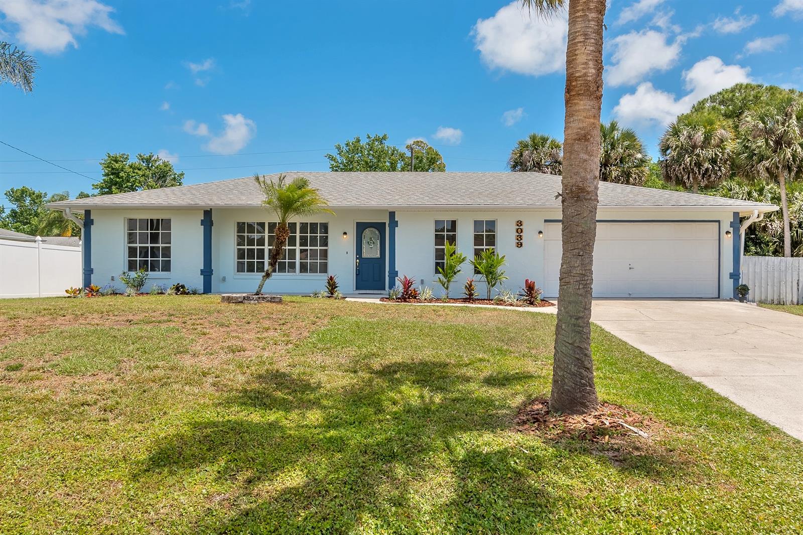Welcome home to your completely updated 3 bedroom 2 bath saltwater pool home.  Nothing has been left untouched from the freshly painted exterior, new landscaping, freshly painted interior, all new vinyl flooring, new carpet in bedrooms, all new lighting and fixtures.  The kitchen has new white cabinets, stainless steel appliances, new countertops, backsplash, and a new kitchen sink.  Plenty of room in the spacious fenced back yard, huge screened in lania with LARGE salt water pool with additional covered patio space along with a shed in the back yard for storage making this the perfect Florida home.  AC is 2022, brand new pool pump 2022 ,with newer roof. ;Water: City
