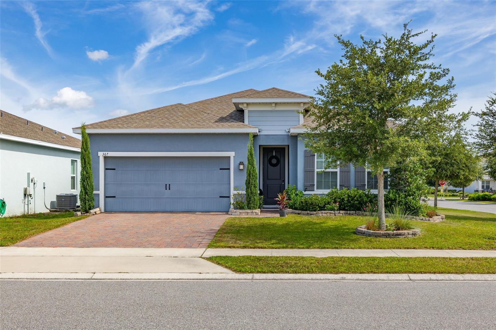 Welcome to 367 August Fern Loop in beautiful Mount Dora, Florida. This stunning single-story home features four bedrooms and two bathrooms, offering a perfect balance of comfort and functionality within a thoughtfully designed open-concept layout.

The interior is filled with natural light, highlighted by tall ceilings, expansive windows, and elegant finishes. At the heart of the home, the kitchen is appointed with granite countertops, stainless steel appliances, a generous center island, and a spacious walk-in pantry. Additionally, the primary bathroom includes a large walk-in shower and an oversized closet.

The split-bedroom layout provides excellent privacy and versatility for a variety of lifestyles. Outside, the fenced backyard offers a great space for pets, gardening, play, or outdoor entertaining. The property also includes a two-car garage, a dedicated laundry room, and ample storage space throughout.

Located in the peaceful Dora Landings community, you are only minutes from downtown Mount Dora and downtown Eustis. Known as “Festival City,” Mount Dora is a relaxing lakefront getaway that hosts more than 30 festivals a year alongside a bustling downtown and numerous parks. The community itself offers a playground and park, with easy access to local restaurants, shopping, and major highways for a quick commute to Orlando.

If you are looking for a spacious, upgraded home that captures the Mount Dora lifestyle, this is the perfect opportunity. Please call today to schedule your private showing.