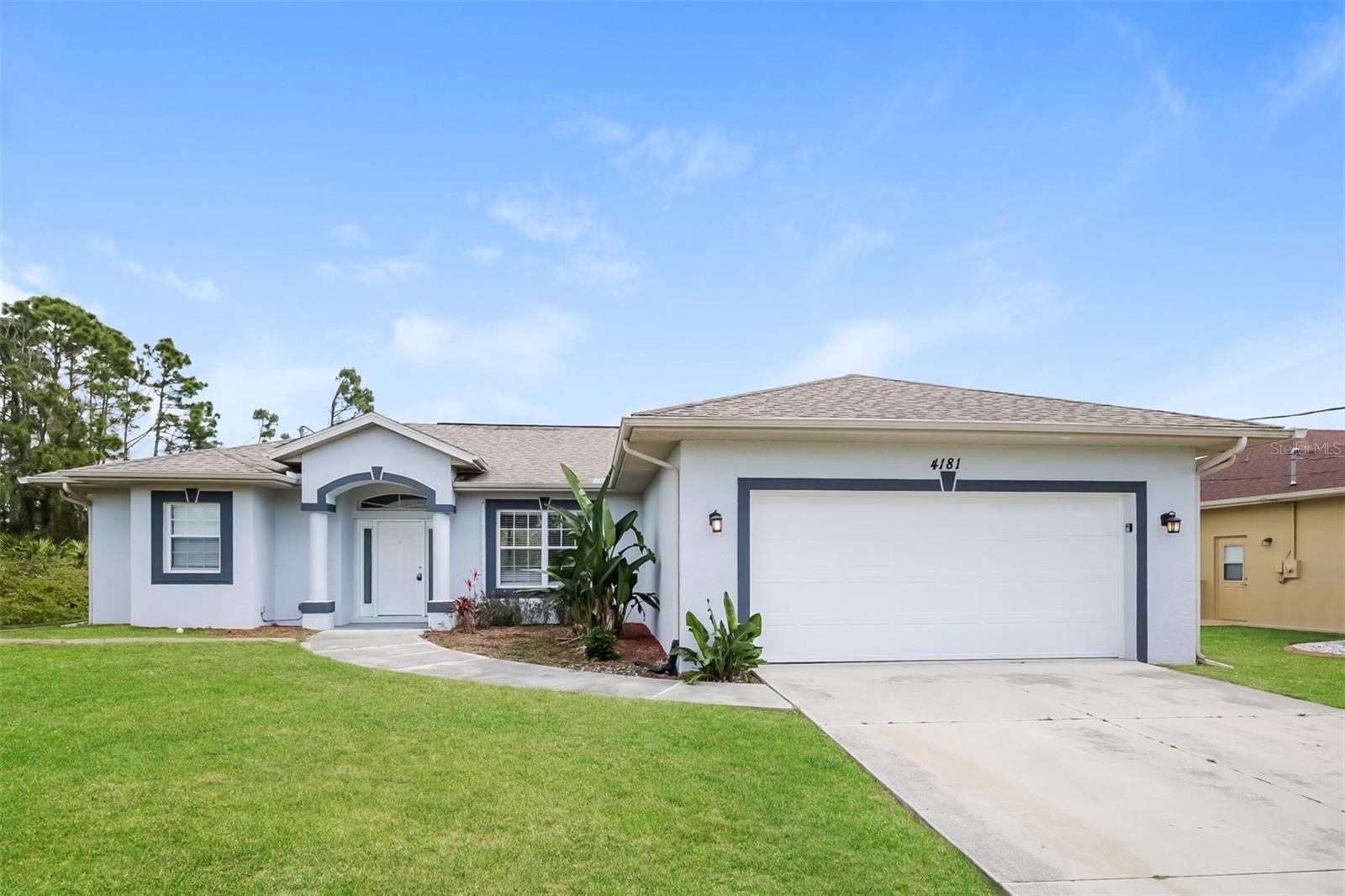 Beautiful move-in ready home featuring a bright and open layout that blends functionality with comfort. The living areas provide a welcoming flow that makes everyday living easy and enjoyable. Step outside to a fenced backyard with a screened in patio area, perfect for entertaining or relaxing in private. The home is complete with a 2-car garage and a well-maintained exterior. Easy to show!