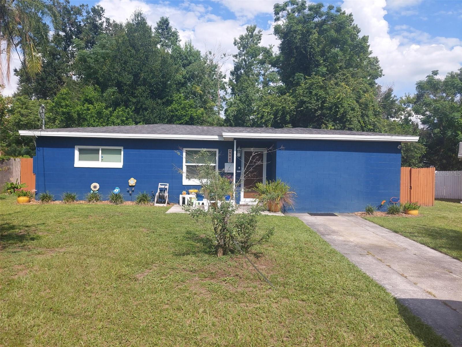 Welcome home to this well-maintained 3-bedroom, 2-bath home nestled on a spacious 0.31-acre cul-de-sac lot! Inside, you'll find an open, inviting layout featuring laminate wood flooring throughout the main living areas and tile in the wet areas. The kitchen offers updated cabinetry, countertops, and appliances, while both bathrooms have been tastefully updated with newer vanities, fixtures, mirrors, and toilets.

Major improvements completed in 2015 include the roof, plumbing, electrical panels, A/C system, water heater, and all windows, which were replaced with hurricane-strength windows, providing added peace of mind. Additional features include interior and exterior paint, updated lighting, blinds, and an inside laundry area complete with a washer and dryer.

Step outside to enjoy the oversized backyard with endless possibilities. Whether you've been dreaming of a vegetable garden, a play area, or space to entertain, this yard has room for it all. You'll also love the **mature starfruit tree**, which produces fruit, along with a utility shed for extra storage and an extended driveway with ample parking.

Additional features include an ADT alarm system with sensors on all exterior doors and windows, plus a Ring video doorbell. Security equipment conveys with the home.
Conveniently located just minutes from downtown Orlando with easy access to I-4, shopping, dining, and popular attractions including Universal Orlando Resort and Walt Disney World Resort, this home offers both comfort and convenience.

Don't miss your opportunity to make this charming property your own!