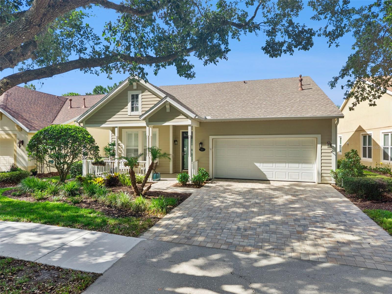 Expect to be impressed by this updated & meticulously maintained 3 BD/ 2 BA Flamingo floorplan with fantastic street appeal, front porch, brick paver driveway & a conservation area view within the Victoria Gardens 55+ neighborhood. Recent updates include new roof in 2022, kitchen renovation, stainless steel appliances; granite countertops, sinks & flooring in both bathrooms, luxury vinyl flooring, lighting fixtures all in 2020! As you enter you will enjoy the formal dining room area for those special occasions or can be utilized as an additional den/office. Homeowner renovated the kitchen island with pendant lighting above to make it more functional & for everyday use. Kitchen features 42” “soft close” cabinets with crown molding, glass door inserts, tile backsplash, Pot & Pan drawers, Quartz countertops & newer stainless-steel appliances including the 5-burner gas range. Spacious primary suite provides the personalized touches such as a large walk-in closet, granite countertop vanity w/ updated dual sinks, faucets & ceramic tile flooring, picture frame mirrors, glass enclosed walk-in shower & a soaking tub. Luxury vinyl floors flow throughout the majority of the home & no carpet! Plantation style shutters & crown molding adds to this home’s appeal. You will enjoy your morning coffee or late afternoon beverage on the 16’x 8’ enclosed lanai with sliding windows overlooking the private conservation area. All appliances stay with the home. Victoria Garden residents have access to their own Private Clubhouse. HOA fee includes lawn care, Spectrum HFC TV & internet and reclaimed water for yard irrigation. Community is within 1 mile of I-4 that offers great access to the east coast beaches, Orlando (40 minutes) and 3 International airports within 1 hour.