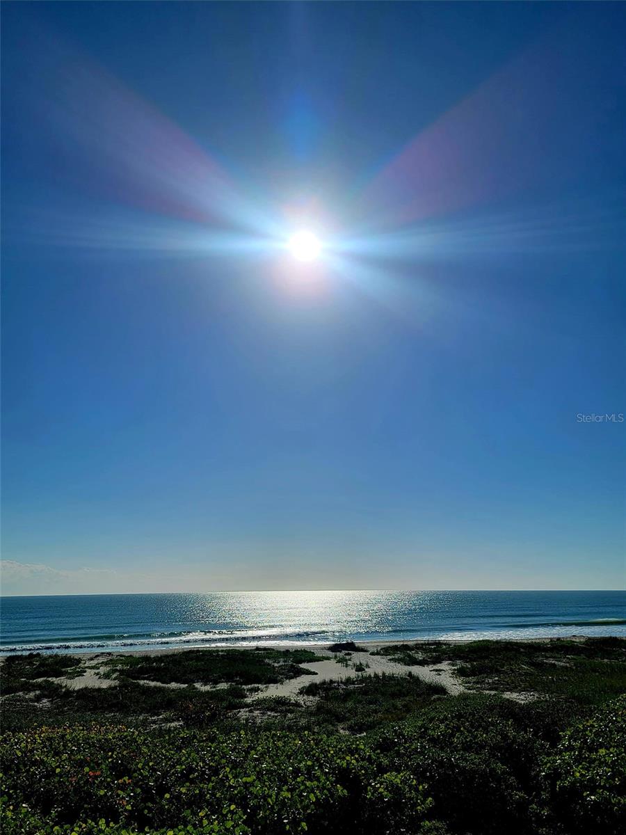 DIRECT OCEANFRONT - Welcome to XANADU, one of the most desired properties in Cocoa Beach. Wake up to the sound of ocean waves and panoramic views of the Atlantic from this 11th floor, spacious, oceanfront condo. Watch the rocket launches, cruise ships and more from the oceanfront balcony and enjoy the views from your kitchen, living room and bedroom. With a perfect blend of full time or vacation beach retreat living, this condo offers resort style amenities including private beach access, heated pool, hot tub, sauna, fitness room, tennis courts, BBQ area, two elevators, car wash station, and recreation room with kitchen.  Purchase this condo with the comfort of knowing all assessments have been fully paid, mandatory milestone inspections have been passed, new building roof (2023), new parking lot pavers as well as complete building concrete restoration and new balcony/atrium flooring in 2022.  Condo fees include high speed internet, cable, sewer, trash, water, onsite management, building maintenance, building taxes and insurance, as well as all of the amenities previously mentioned above. Xanadu is close to Port Canaveral, Ron Jon Surf Shop, Kennedy Space Center, Cocoa Village, Cocoa Beach Pier and much more.  Also, just a short drive to Orlando International Airport, Melbourne Airport, Disney World, Sea World, Universal and other attractions. Copies of Bylaws, Declarations, Rules & Regulations, and Milestone Report, can be viewed from the Xanadu Condominium website.  Contact seller's agent, Beverly Thornton, for showing and information.