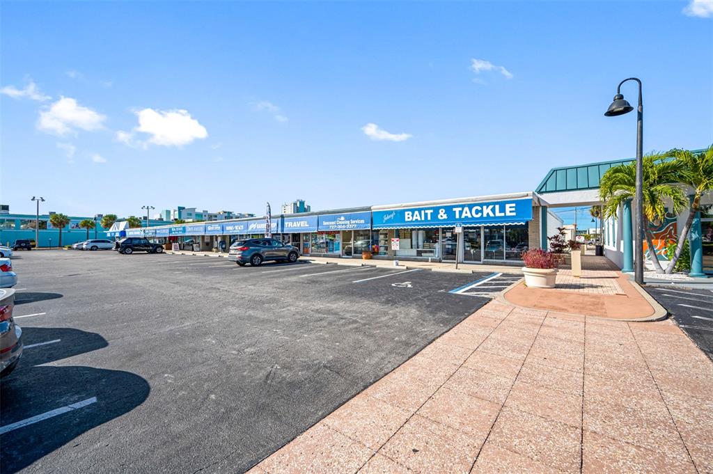 NEVER BEFORE OFFERED TREASURE ISLAND STRIP PLAZA!! Vintage mid 1950’s construction and in the same family ownership since inception. Property situated in the absolute “hub of tourist activity” lining the North side of Treasure Island Causeway (107th Ave.) ...starting with Liberte' (aka as Vacatia) and continues to Johnny's Bait and Tackle...just a block from the Gulf of Mexico!! Property is currently a fully functioning strip plaza with 11 (mostly long term) tenants and with no vacancies. Extensive roof repair/replacement recently completed. As the highest and best use of the property may be re-development it is not being marketed based upon current or past income and expense history nor capitalization rates.…Description: NORTH PLAZA…118 – 146 107th Ave., .. 14 contiguous store fronts currently with building area approx. 15,000 sq,. ft., plus deeded parking area all totaling 46,600 sq. ft. mol . .. Zoned Mixed Use Core (PR-MU core) permitting a multitude of potential re-development opportunities. Drive-by only. Please do not approach tenants directly under any circumstances.