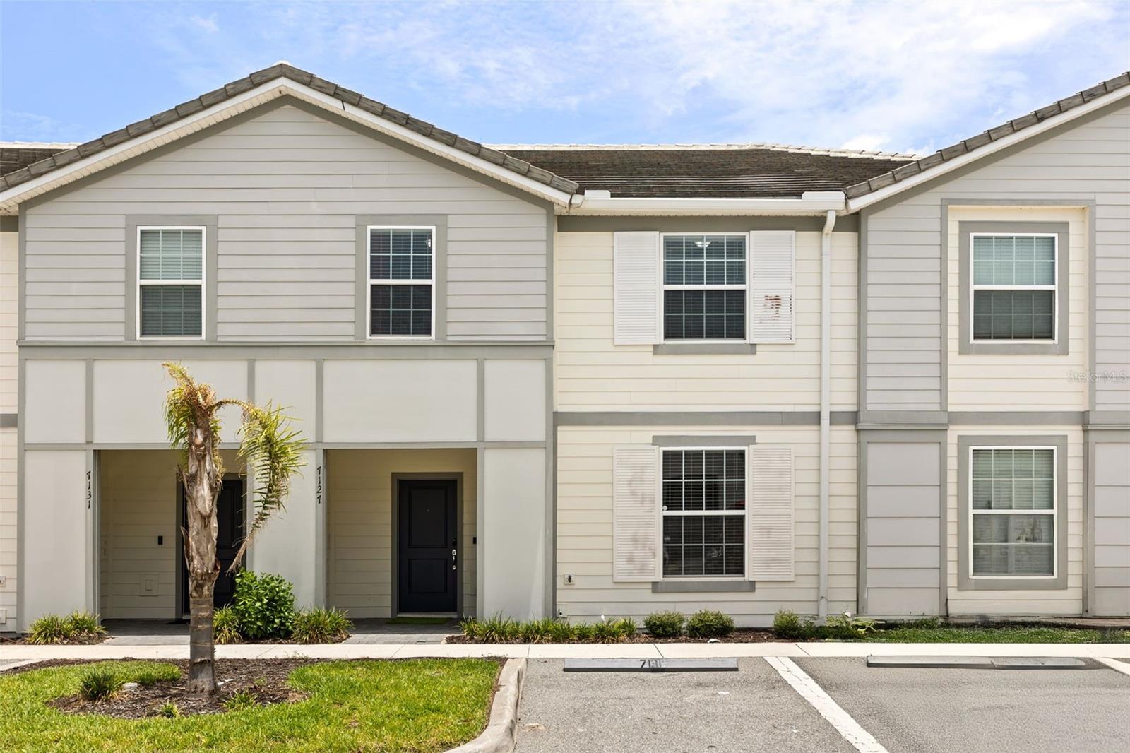 Beautifully furnished 5-bedroom, 4.5-bath end-unit townhome in the highly desirable Solterra Resort. Built in 2022, this spacious home features an open-concept floor plan, first-floor guest suite, upstairs loft, quartz countertops, stainless steel appliances, and a private screened heated pool with pool bath. Short-term rentals are permitted, making this an excellent primary residence, vacation home, or investment opportunity. Enjoy resort-style amenities including a lazy river, water slide, clubhouse, fitness center, sports courts, and 24-hour gated security, all just minutes from Disney, ChampionsGate, shopping, dining, and major highways.