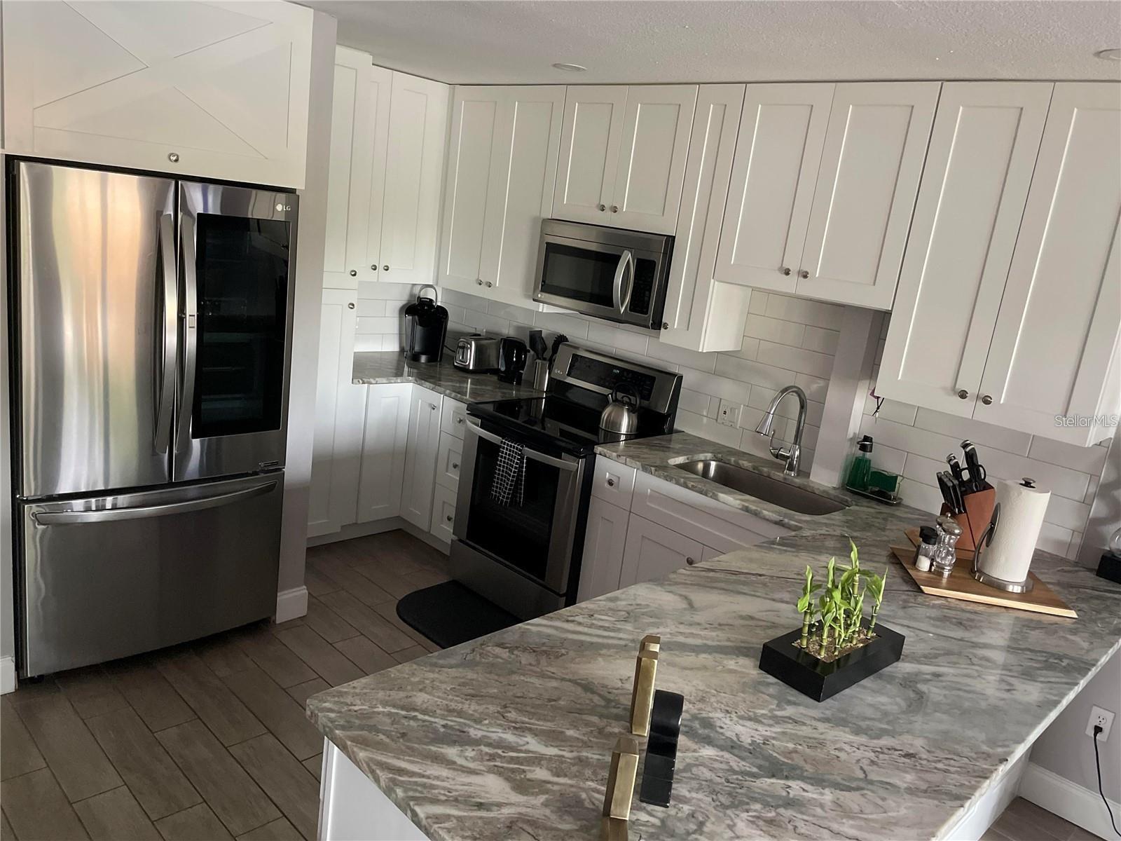 LAKE TARPON VILLAS CONDO - Residential