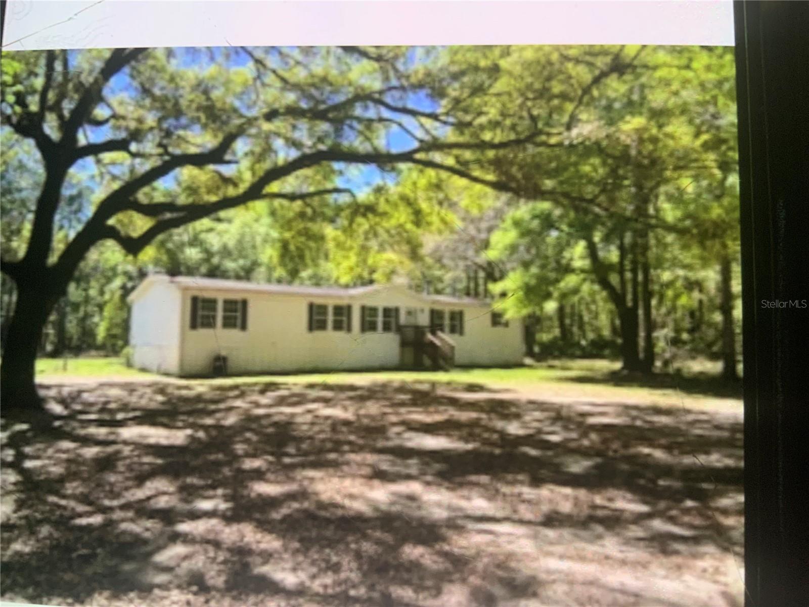 If you are searching for privacy look no further,
This spacious 4/3 Manufactured Home is nestled among mature trees . Large rooms include oversized living room, spacious kitchen with views of pond and wildlife , En-suite located in this split bedroom floor plan


Also available for rent -$2500 /month plus utilities (furnished)