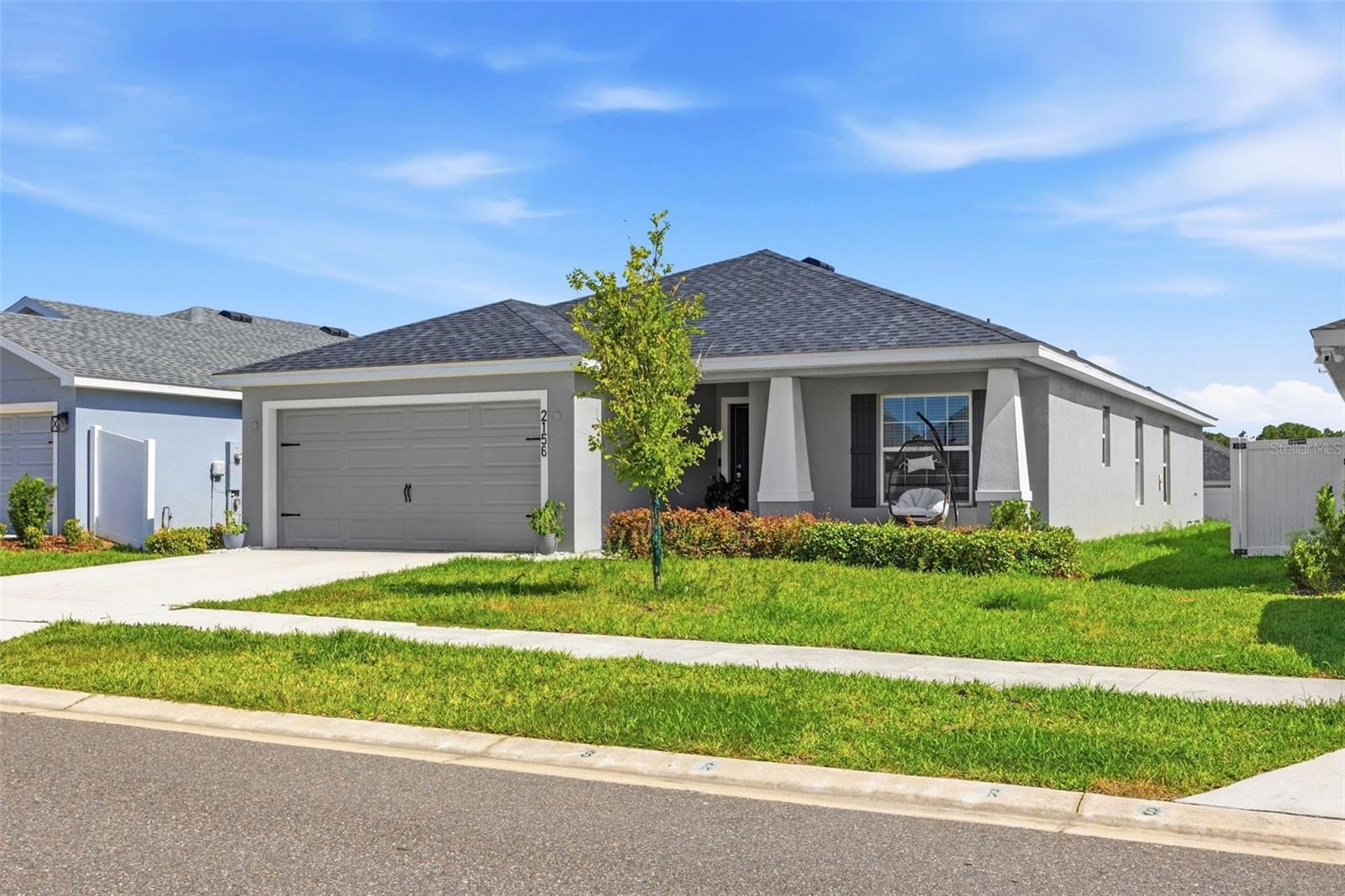 Welcome to 2156 Desert Rose Drive in Davenport! This beautiful 4-bedroom, 2-bath home features an open-concept floor plan with a modern kitchen offering granite countertops, stainless steel appliances, a large island, and a walk-in pantry. The spacious primary suite includes a walk-in closet, dual vanities, and a tiled shower. Enjoy a covered lanai, two-car garage, and a convenient location near I-4, shopping, dining, Disney, and other Central Florida attractions. Move-in ready—schedule your private showing today!