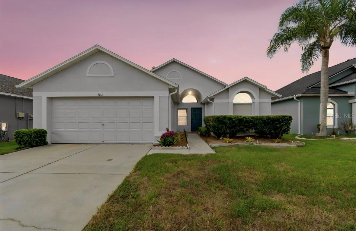Welcome to this beautifully maintained home located in the highly desirable gated community of Oakstead in the heart of Land O’ Lakes. This inviting residence features 3 spacious bedrooms, 2 full bathrooms, and a functional split floor plan with an open-concept design, soaring vaulted ceilings, and separate living and dining areas that create a bright and welcoming atmosphere.

The spacious kitchen overlooks the main living area, making it ideal for entertaining family and friends, and features newer stainless steel appliances. The washer and dryer are also included, making this home truly move-in ready. The interior laundry room provides added convenience and comfort, while ceiling fans in the bedrooms and recessed lighting in the kitchen enhance both style and functionality. For added peace of mind, the HVAC system and water heater were both replaced in 2018, the exterior was freshly painted in 2015, and the roof was replaced in 2021.

Step outside to the covered rear lanai, the perfect place to relax and unwind after a long day while enjoying the privacy of your fully fenced backyard. Whether you have children, pets, or simply enjoy outdoor living, this backyard offers plenty of space for recreation and entertaining.

Oakstead offers exceptional community amenities, including a resort-style swimming pool, clubhouse, playgrounds, parks, and recreational areas for residents to enjoy.

Conveniently located just minutes from the Veterans Expressway, Interstate 75, shopping centers, Publix, Target, Starbucks, restaurants, and top-rated schools, this home combines comfort, convenience, and an outstanding location. Priced to sell, this is an excellent opportunity to own a home in one of Land O’ Lakes’ most sought-after communities. Schedule your private showing today before it’s gone.