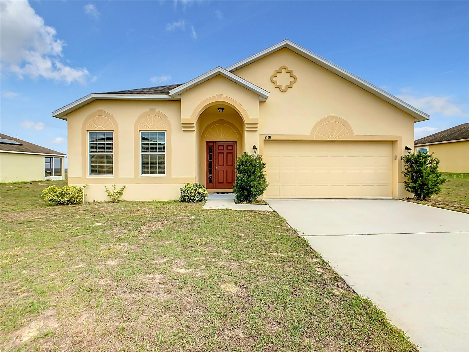Turnkey and ready for its next owner! This well-maintained 3-bedroom, 2-bath home features a bright open-concept floor plan designed for comfortable everyday living. Situated on a spacious homesite with no rear neighbors and generous distance between neighboring homes, this property offers added privacy. Enjoy the extended covered and screened lanai, perfect for relaxing or entertaining year-round. Low HOA and no CDD.