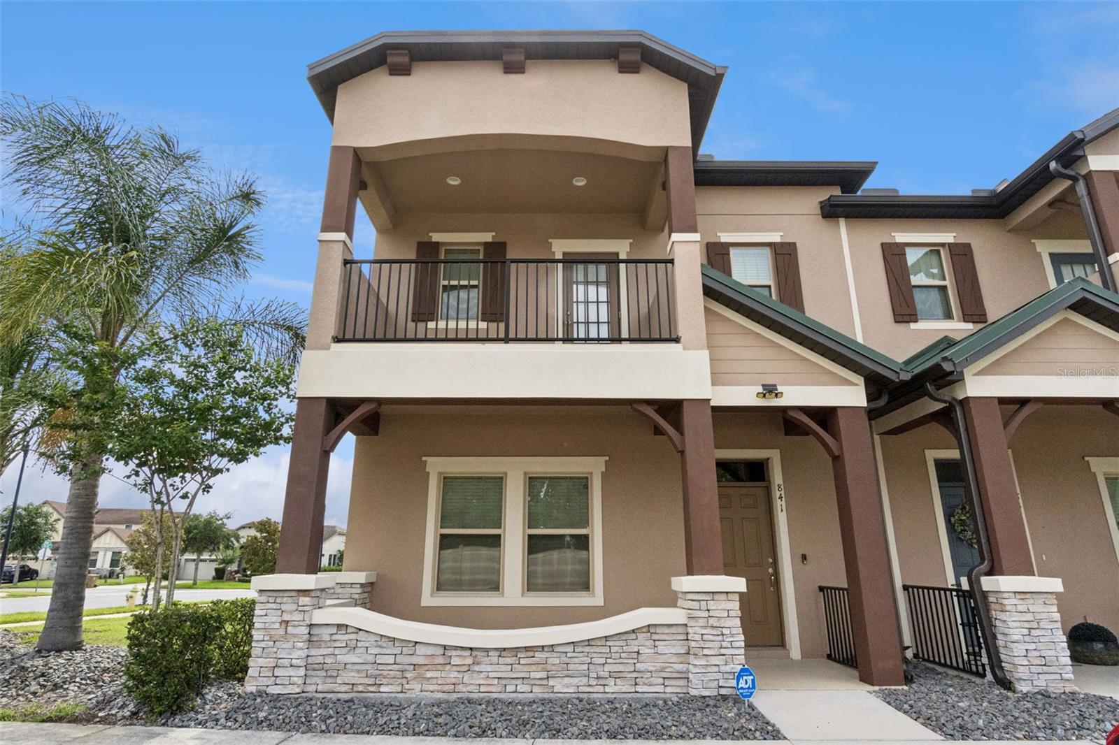 Why wait for new construction! Welcome home to this beautifully designed 4 Bed 3.5 Bath corner lot townhome in Stonewood Estates featuring two spacious primary suites, offering the perfect blend of comfort, flexibility, and privacy. One primary bedroom is conveniently located on the first floor, making it ideal for multi-generational living, guests, a home office, or anyone seeking easy access without stairs.  Upstairs, the primary suite features its own private balcony—an ideal spot to enjoy your morning coffee or unwind at the end of the day providing a private retreat with ample space and comfort.Designed for modern living, the home features impressive 10-foot ceilings on the first floor and vinyl plank flooring throughout the main living areas, creating a bright, open, and inviting atmosphere.The gourmet kitchen is the heart of the home, thoughtfully designed for both everyday living and entertaining. Enjoy 42-inch cabinetry, stainless steel appliances, granite countertops, an oversized center island, and a spacious pantry, providing abundant storage, prep space, and seating for family and guests.The spacious layout offers flexibility and privacy, while the attached two-car garage provides added convenience and extra storage space. Situated on a desirable corner lot, this home offers added curb appeal, enhanced privacy, and additional outdoor space. Its prime location places you just minutes from shopping, dining, entertainment, world-famous theme parks, Orlando International Airport, and the thriving communities of Lake Nona and Medical City, making commuting and everyday errands effortless.
Whether you're looking for a primary residence or a low-maintenance lifestyle close to everything , this exceptional townhome checks all the boxes.