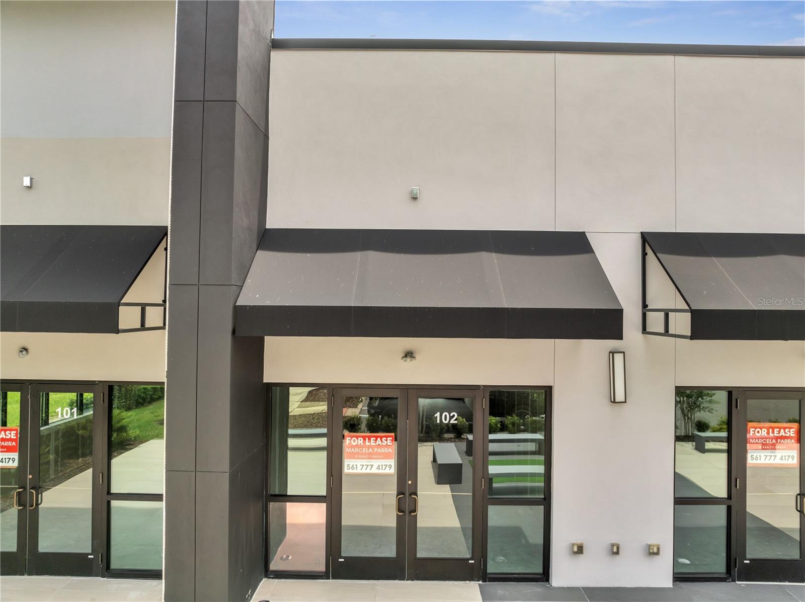 Step into a high-visibility opportunity at University Station. Unit 102 is a 750 sq ft ground-floor commercial condo in a 2022-built center less than a mile from UCF, featuring a modern storefront façade, high ceilings, and shared surface parking. The space offers a flexible footprint ideal for retail, boutique office, wellness/beauty, or professional services seeking a clean, contemporary presence along Rouse Road.

Surrounded by everyday amenities at Waterford Lakes and the UCF/Research Park area, the property enjoys easy access to major roadways, nearby campuses including Valencia College and Full Sail, and is roughly 20–25 minutes to Orlando International Airport—convenient for both local clientele and out-of-town visitors. With a recent price improvement, Unit 102 is now well positioned for buyers focused on long-term return on investment.
