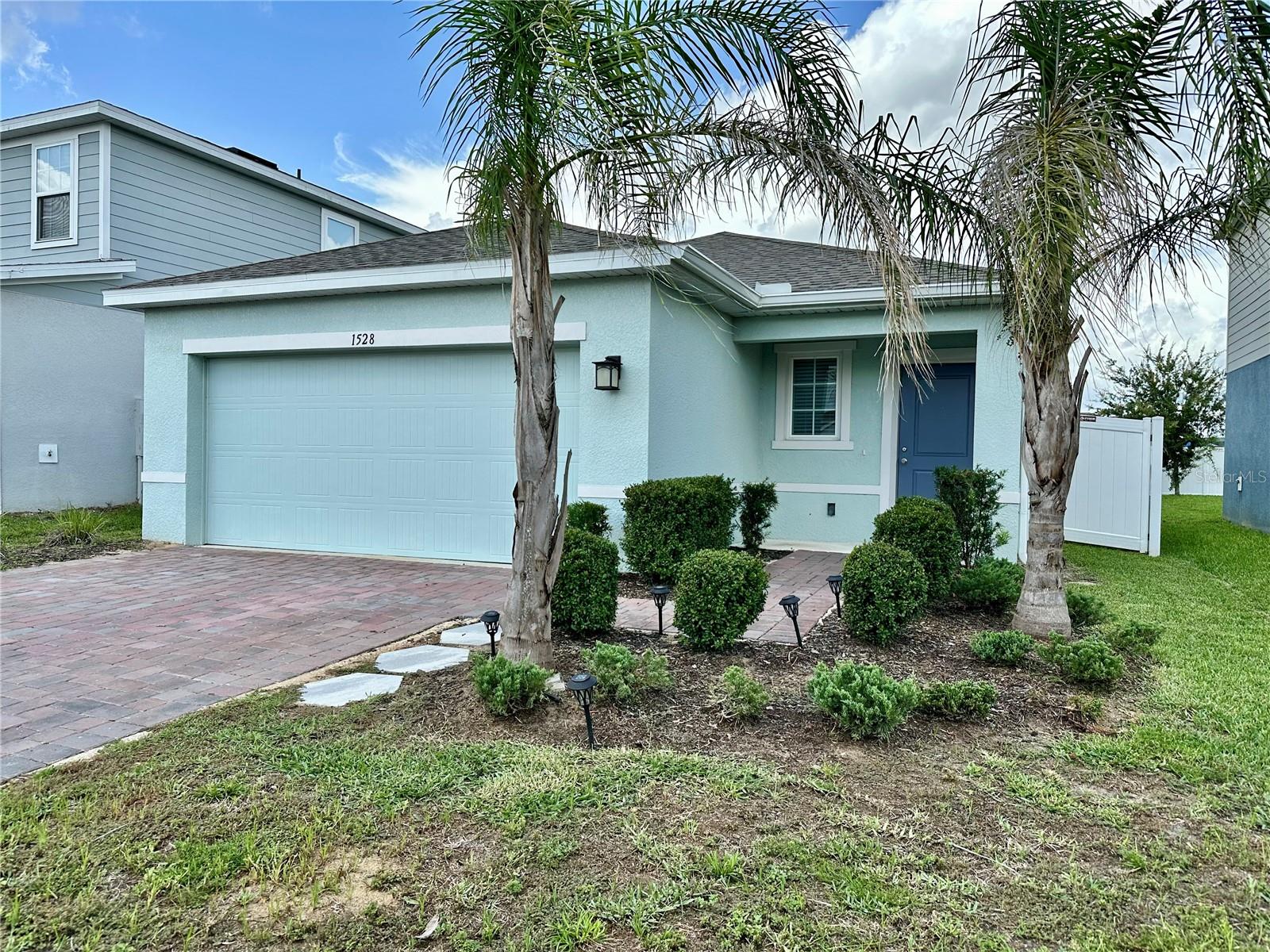 Welcome to 1528 Eucalyptus Way, Davenport, FL 33837! This beautifully maintained 3-bedroom, 2-bath home offers the perfect combination of style, comfort, and convenience. The open-concept floor plan is filled with natural light, creating a bright and welcoming living space ideal for everyday living and entertaining.

The kitchen features granite countertops, stylish two-tone cabinets, and all appliances are included, making this home truly move-in ready. Ceramic tile flooring throughout the main living areas provides durability and easy maintenance, while the spacious layout offers comfortable living for family and guests.

The primary suite offers a relaxing retreat, and the additional bedrooms provide flexibility for family, guests, or a home office. The 2-car garage features an epoxy-coated floor for a clean, polished finish.

Step outside to enjoy the backyard with artificial turf, providing a low-maintenance outdoor space that's perfect for entertaining, relaxing, or year-round Florida living.

Residents enjoy a community pool and playground, all with an incredibly low HOA fee of just $150 per year.

Ideally located near shopping, dining, schools, and major roadways, this home is approximately 15 miles to Walt Disney World Resort, 20 miles to ESPN Wide World of Sports, 23 miles to SeaWorld Orlando, 27 miles to Universal Orlando Resort, and 35 miles to LEGOLAND Florida Resort. Commuting is easy with quick access to US-27 (about 5 miles), I-4 (about 8 miles), SR-429 (about 15 miles), and SR-417 (about 18 miles).

Whether you're looking for a primary residence, vacation home, or investment opportunity, this move-in-ready home offers exceptional value in one of Davenport's fastest-growing areas. Don't miss your opportunity to make it yours!