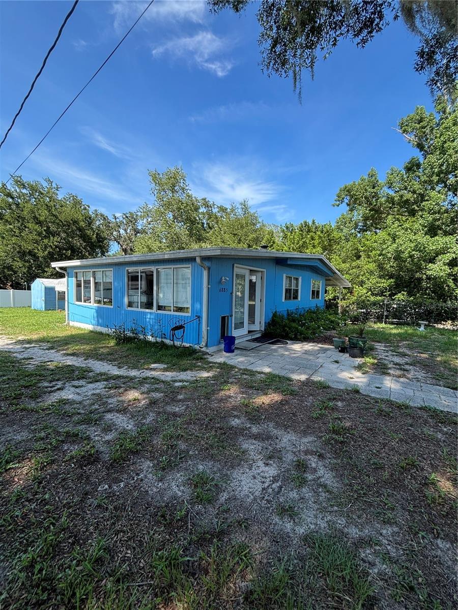 This Home is located in Ocala Heights 3 Bedroom 2 Bathroom living area 1152 sq.ft on .23 acres. The property includes stainless steel appliances. The AC system and LVP flooring were installed in 2023. Enclosed large lanai 12' X 24' for gatherings. The fenced in yard has 3 storage sheds. Located near shopping centers, restaurants and downtown Ocala.