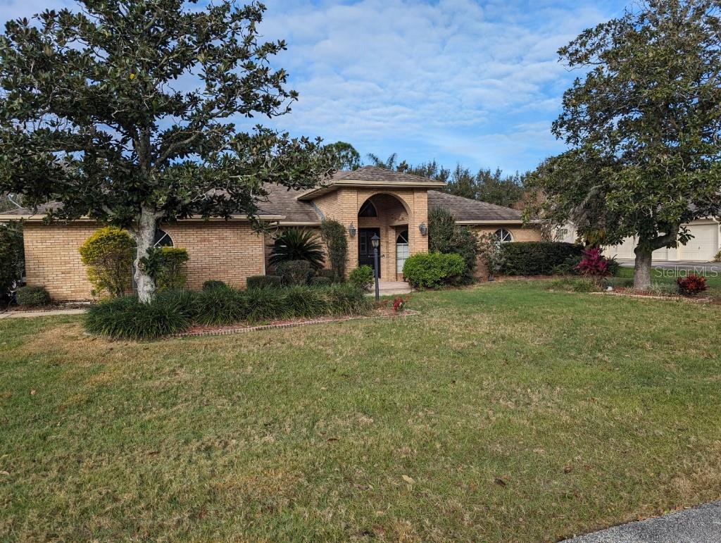 A beautiful home that was completely updated and remodeled 7 years ago. It is not your standard conservative retiree home. Jeni Hickson, arguably the best interior designer on the East Coast of Florida, spent several weeks getting this house just right for the hip, younger/middle-aged entertainer crowd. This island bar kitchen, in the open area overseas three sliding glass windows that adjoin the covered patio leading to the oversized screened-in pool. The pool has both an electric heat pump and a solar heater so it can be used year round.  It has an open floor plan with the master bedroom split from the other three on the north side of the home. Adjoining the master is a beautiful, large spa bathtub with a shower to one side. An exceptionally well-thought-out home that has been lovingly maintained. Quiet street that leads to a cul-de-sac so you never have constant traffic. If they come by, they live here. Homes like this don't come available often and it is sure to sell quickly.