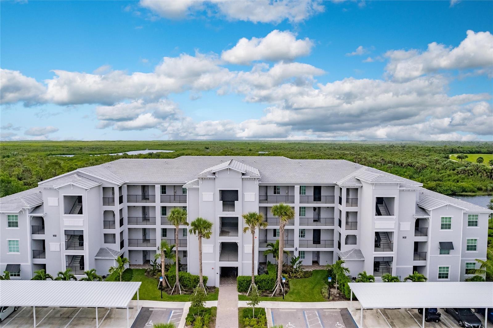 What could be better than SUNSHINE and GOLF?! Welcome to resort-style living at its finest in Heritage Landing Golf and Country Club, located in Punta Gorda, sunny Southwest Florida! The highly sought-after 3 bedroom, 2 bath CAROLINA Model end unit offers a luxurious lifestyle with GOLF MEMBERSHIP INCLUDED. Nestled on the 3rd floor with no unit above, you’ll enjoy the peace, privacy, and stunning Charlotte Harbor views. As you enter the home you will enjoy the screened entry-way with a Ring doorbell and camera for extra security. This home offers a spacious and inviting interior flooded with natural light. The open floor plan seamlessly connects the living, dining, and kitchen areas, creating an ideal space for both relaxation and entertaining. The well-appointed kitchen features stainless steel appliances and ample cabinet space including a pantry and a convenient breakfast bar. The master suite presents a tranquil retreat with a private en-suite bathroom, providing the perfect sanctuary to unwind after a day on the course or you can step out onto the screened-in lanai to soak in beautiful sunsets Heritage Landing offers maintenance-free, resort-style living with a Gordon Lewis-designed 18-hole, Par 71 golf course, a Tennis Center featuring Har Tru tennis courts, pickleball, bocce ball courts, and a 24/7 Fitness Center equipped with Nautilus machines, treadmills, ellipticals, and more. Relax at the Main Resort Pool with poolside service from the Tiki Bar, which also boasts three big-screen TVs and live entertainment. Enjoy saunas, massages, facials, and nail services at the Getaway Spa, or unwind in one of the two pools. More amenities are coming, and you’re just minutes from Burnt Store Marina for dining, entertainment, and boating. Located conveniently between Ft. Myers and Punta Gorda airports, this is your chance to experience all that Southwest Florida offers. Schedule a showing today! Buyer to verify room dimensions.