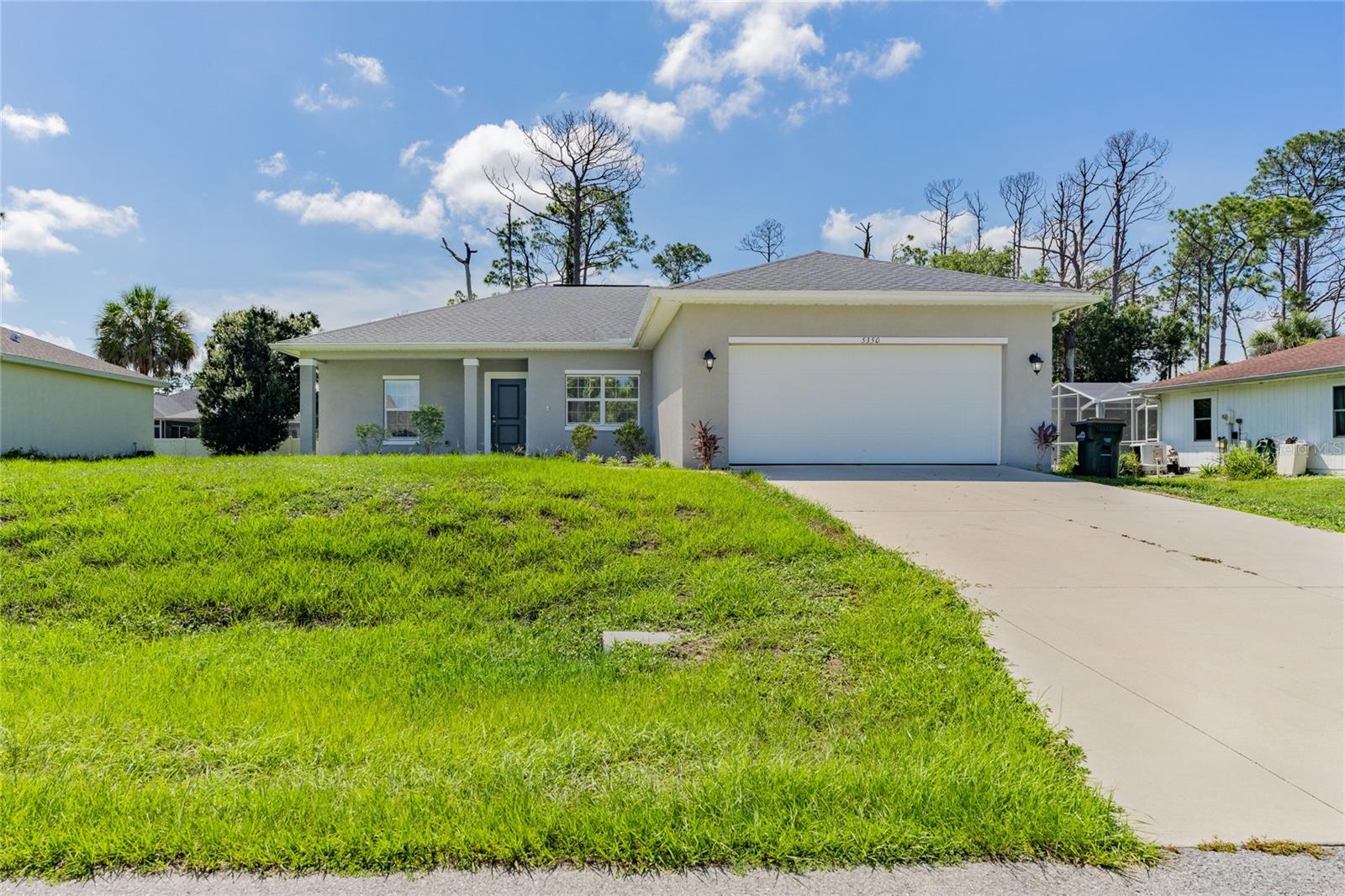 Built in 2020, this well-maintained 3-bedroom, 2-bath home offers comfortable living space in a desirable North Port location. The home features a functional open-concept floor plan with a split-bedroom layout, providing both privacy and an easy flow for everyday living.
The kitchen opens directly to the main living and dining areas, creating a central gathering space that works well for both daily use and entertaining. The primary suite is positioned separately from the secondary bedrooms and includes its own private bath. The interior layout is designed to maximize usable space while maintaining a simple and practical design. Located in North Port, the property offers convenient access to shopping, dining, schools, parks, golf courses, and I-75 for easy commuting throughout Southwest Florida. This home is a great option for a primary residence, seasonal use, or long-term investment.