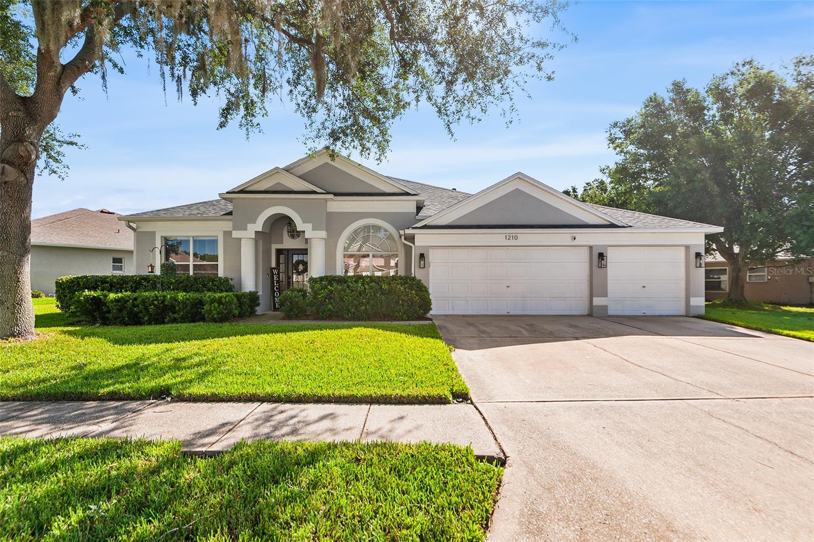 Welcome to this beautifully maintained 4-bedroom, 3 bath, pool-ready home with a 3-car garage in the highly sought after Lakes at Northwood community in Wesley Chapel!
Situated on a generous ¼-acre homesite, this spacious property offers plenty of room to create your own backyard oasis, including space for a pool. The fully vinyl fenced backyard features 2 gates for convenience, while French doors from both the family room and the primary suite create seamless indoor-outdoor living and easy access to the backyard.
Designed with today’s lifestyle in mind, the open-concept floor plan is centered around a stunning kitchen featuring an oversized island with quartz counter tops. The other kitchen counters boast granite counter tops with abundant 42” cabinetry and ample prep space-perfect for entertaining or everyday living.
The inviting family room showcases custom built-ins with a decorative electric fireplace, creating a warm and stylish focal point. Luxury vinyl plank flooring flows throughout the main living areas, while the bedrooms feature comfortable carpeting. The primary bath is finished with wood-like tile flooring complementing the home’s quality finishes.
The thoughtfully designed split-bedroom layout offers both comfort and privacy. The spacious primary suite includes a walk-in closet and a beautifully appointed en-suite with dual vanities, a relaxing garden tub, separate shower, and private water closet. The second bedroom enjoys its own private en-suite bath, while the 3rd and 4th bedrooms each feature walk-in closets and share a full bath with dual sinks and a tub/shower combination.
Additional features include a separate office with French doors, an indoor laundry room, an irrigated St. Augustine lawn, granite counters in all bathrooms, and numerous updates including a new roof (December 2022), HVAC system (2020), water heater (March 2019) and water softener (2025).
Residents of Lakes at Northwood enjoy exceptional community amenities including recently updated playground, tennis court, pickle ball court and sidewalks. With low HOA and no CDD fees, this community offers an outstanding combination of value and amenities.
Conveniently located near shopping, dining, medical facilities, major highways, and everyday conveniences, this move-in ready home offers the perfect blend of space and comfort.
Thoughtfully updated, exceptionally maintained, and ideally located – this is a home you’ll want to experience in person. Schedule your private showing today!