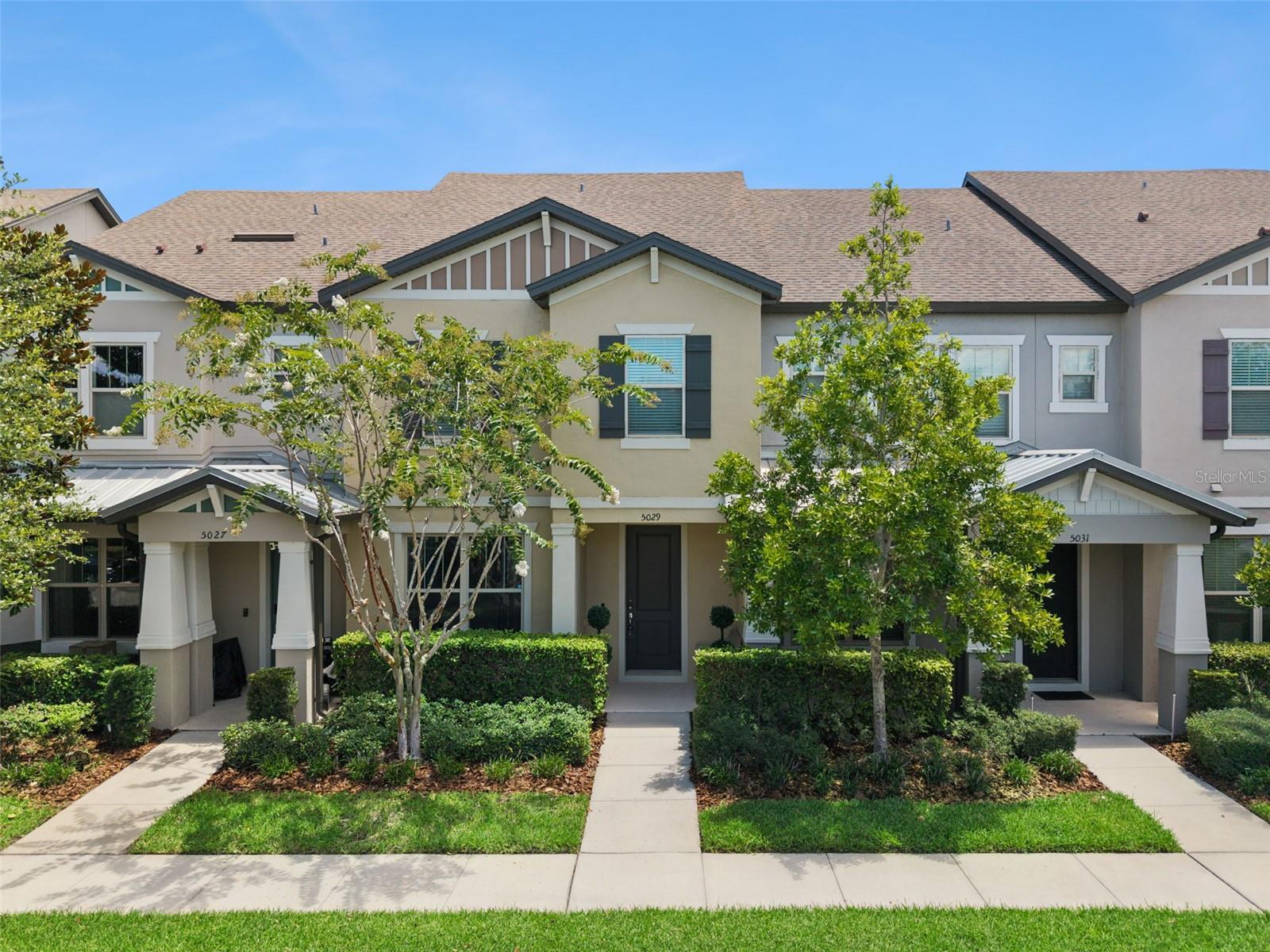 Welcome to this beautifully maintained two-story townhome located in the gated and highly desirable Lakeshore at Narcoossee community. Designed for both everyday comfort and entertaining, the home features an open-concept layout with three spacious bedrooms, and three full bathrooms. A private first-floor bedroom with full bath is ideal for guests or multigenerational living. The second level offers two generous owner’s suites, each with walk-in closets and double-vanity bathrooms. The updated kitchen flows seamlessly into the dining and living areas and showcases granite countertops, ample cabinetry, and stainless-steel appliances—perfect for hosting family and friends. Enjoy outdoor living in the fully fenced private courtyard, ideal for relaxing or entertaining. Residents of Lakeshore at Narcoossee enjoy resort-style amenities including a zero-entry pool and cabana, fitness center, clubhouse, community dock, dog park, playground, and sports areas. The community is conveniently located near shopping, dining, highly rated nearby schools, and everyday conveniences. With no CDD fees, this move-in-ready home offers exceptional value in one of the area’s most sought-after communities. Closing cost assistance may be available with an acceptable offer. Schedule your private showing today.