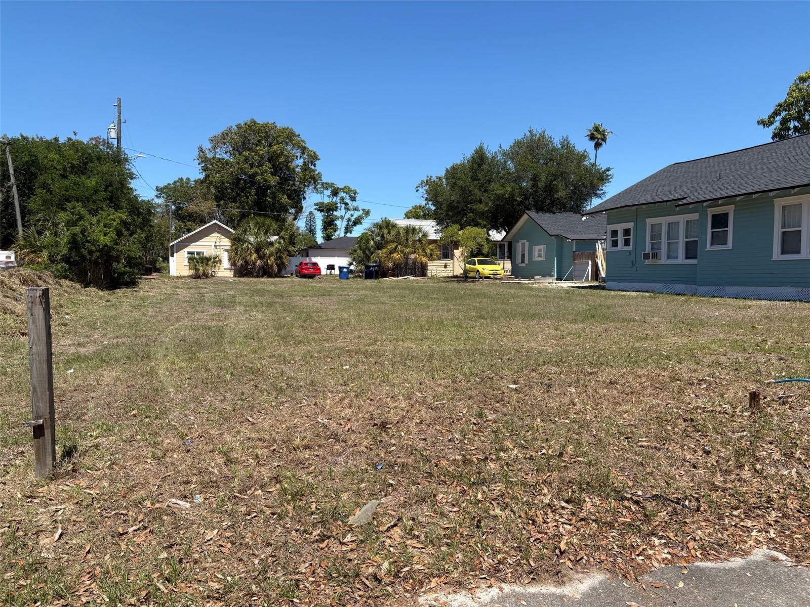 Prime development opportunity in the heart of St. Petersburg! This fully cleared vacant lot on 18th Avenue S is ready for your next project and offers incredible potential in one of the city’s rapidly growing areas. Zoned NTM-1, this 8,251 SF lot presents a rare opportunity for builders, developers, and investors looking to capitalize on the strong demand for new construction and multifamily development in St. Petersburg. With alley access and flexible redevelopment potential, the possibilities are endless. Whether you envision a  multifamily project, investment property, or custom new construction, this property is a blank canvas ready for your vision. The lot has already been cleared, saving valuable time and expense for future development. Conveniently located near downtown St. Petersburg, Gulf beaches, restaurants, shopping, entertainment, and major roadways, this is an exceptional opportunity to secure land in a thriving market before values climb even higher. Don’t miss your chance to build in one of Tampa Bay’s most exciting growth corridors!