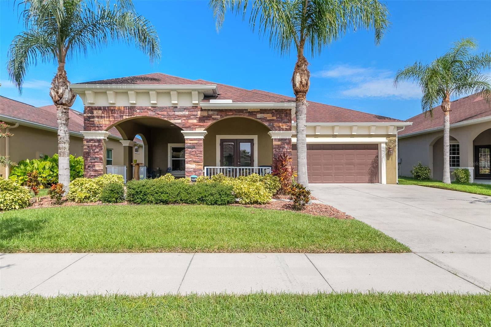 One of the most popular floor plans offered by Paytas Homes is this move in ready lakefront beauty. The home has 3 large bedrooms as well as a separate true office/den. The upgrades and features include, wood tile flooring,  high end custom cabinets, level 4 granite countertops, upgraded stainless appliances,  large screen rear lanai with captivating views of the lake, very large front porch and so much more. All information is intended to be accurate but is not guaranteed. ;Water: City
