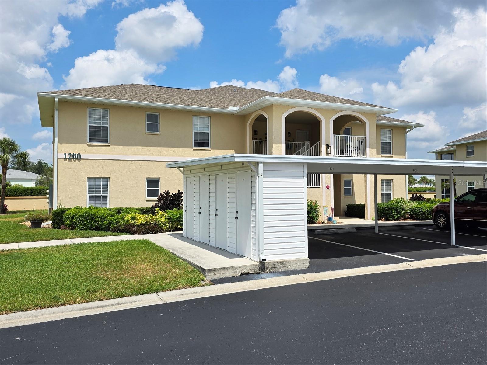 2 bedroom 2 bathroom Ground floor unit with cover parking and extra storage closet and NEW AC in the Gated community of Link Side in Sable Trace. This unit is turn key and ready for you and your tooth brush. It is bright and airy and feel open and large. If living in Florida close to shopping, golf courses and the beach is what you are looking for than this is the place for you. The pool is just a few steps from you door and the Lanai is private and relaxing. this is a must see.