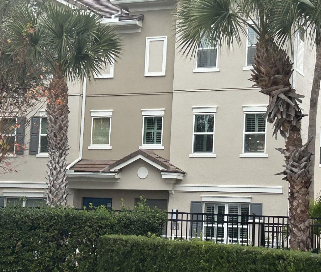 Beautiful end unit 3 story townhome in Grande Oaks at Heathrow.  Conveniently located at the junction of I-4, 417 and 429 and near Colonial Town Park featuring Publix and AMC Theatre.  This unit is loaded with upgrades and sits in a location that provides amazing natural light and privacy for a townhome.   The first floor is currently configured as an office but easily converts to a bedroom with an ensuite bath.  The second floor has the main living areas with massive kitchen, dining and living rooms.  The third floor features a very large master bedroom and a guest bedroom that also has its own bathroom.  The building’s exterior was recently updated with a new roof, new windows, paint and new landscaping.  Just some of the upgraded interior features include: High ceiling throughout with 8’ doors, Trey ceilings, 16 windows all with Plantation Shutters, KitchenAid appliances, Hardwood and tile throughout, Upgraded Master Shower, Custom Master Closet, Upper floor laundry, Oversized Garage with 2 car parking pad….no parking problems here.