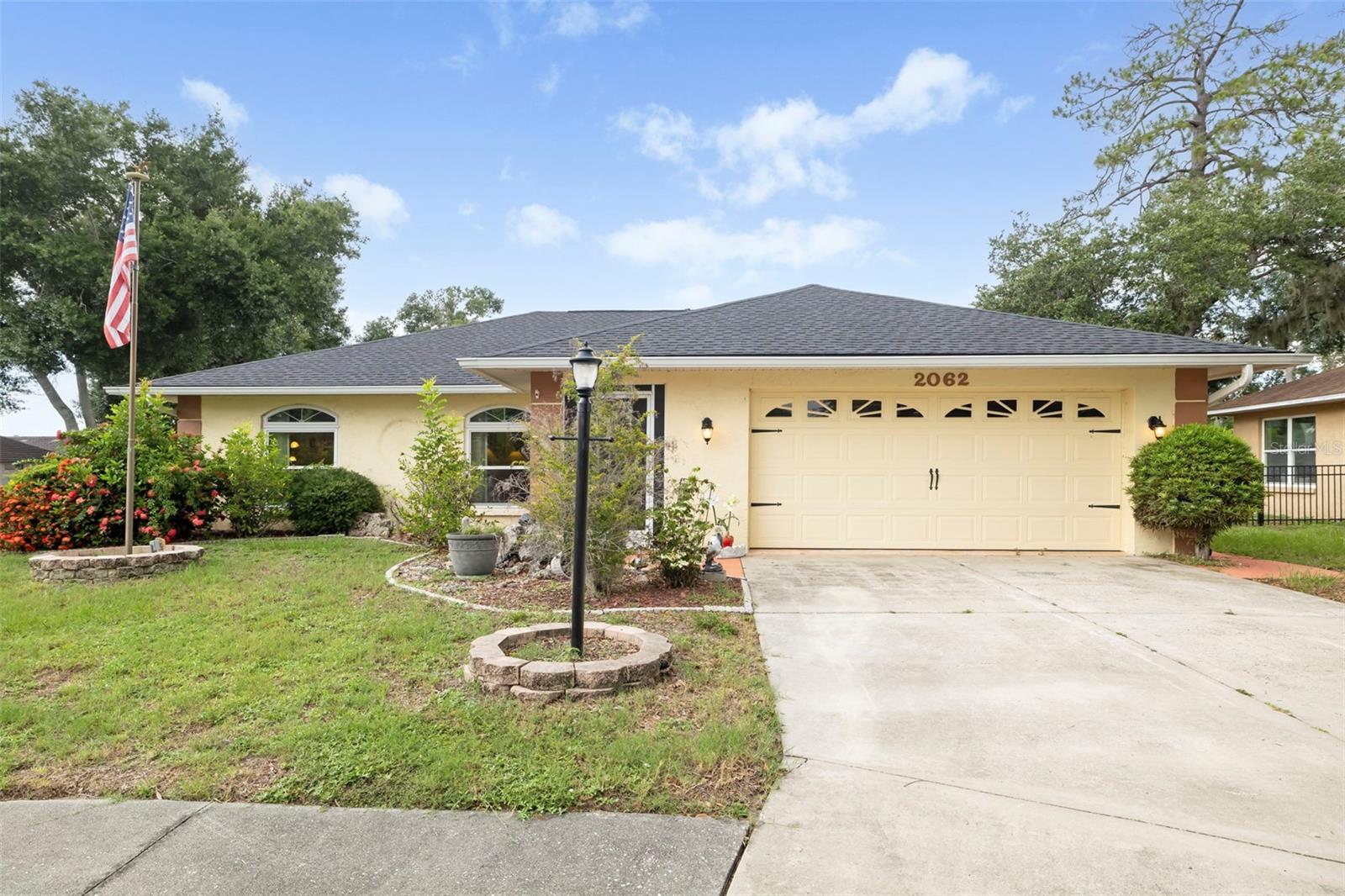 Tucked away at the quiet end of a dead end street, this beautifully maintained 3 bedroom, 2 bath home offers exceptional privacy and a peaceful setting in the desirable Arbor Oaks community. Situated on the curved outer corner of the street and surrounded by mature oak trees, the property enjoys a tranquil atmosphere with a partial lake view. A major bonus is the fully paid-off solar panel system, which is included with the purchase. Enjoy the long-term savings of reduced electric bills without the added expense of assuming a solar loan or lease.

Inside, you'll find a bright, open floor plan featuring a spacious great room with soaring vaulted ceilings and a desirable split bedroom layout. The open kitchen is equipped with newer stainless steel appliances, including the range, refrigerator, and microwave, creating an inviting space for everyday living and entertaining. The primary suite features a walk in closet, a spacious en suite bathroom, and grab bars in the shower for added convenience. The guest bedroom provides comfortable accommodations for family and visitors. Adjacent to the guest bedroom, the guest bathroom features a tub and shower combination, with a convenient linen closet located just outside the bathroom for additional storage.

A versatile den provides valuable extra living space and can easily serve as a home office, media room, hobby room, or sitting area. The dedicated indoor laundry room includes built in cabinetry for added organization.

Step outside to the screened lanai and enjoy the peaceful partial lake view. The lanai is equipped with roll down hurricane shutters and features a convenient outdoor sink, making it the perfect place for grilling, relaxing, or entertaining guests. An adjoining open patio with a retractable shade provides another inviting space to enjoy Florida's beautiful weather. The garage also includes a utility sink, adding extra convenience for gardening, hobbies, or cleanup.

Enjoy the convenience of this centrally located home, ideally situated just off Cattlemen Road between Bee Ridge Road and Fruitville Road. From here, you're only minutes from I 75, downtown Sarasota, University Town Center (UTC), shopping, dining, parks, and everyday conveniences. Arbor Oaks offers the added benefit of low HOA fees and no CDD fees, making it an exceptional value in one of Sarasota's most convenient locations.

Offering a thoughtful layout, functional living spaces, and a serene setting, this exceptional home is ready for you to enjoy the best of Florida living in the quiet, established Arbor Oaks community. Schedule your private showing today and discover all this wonderful home has to provide.