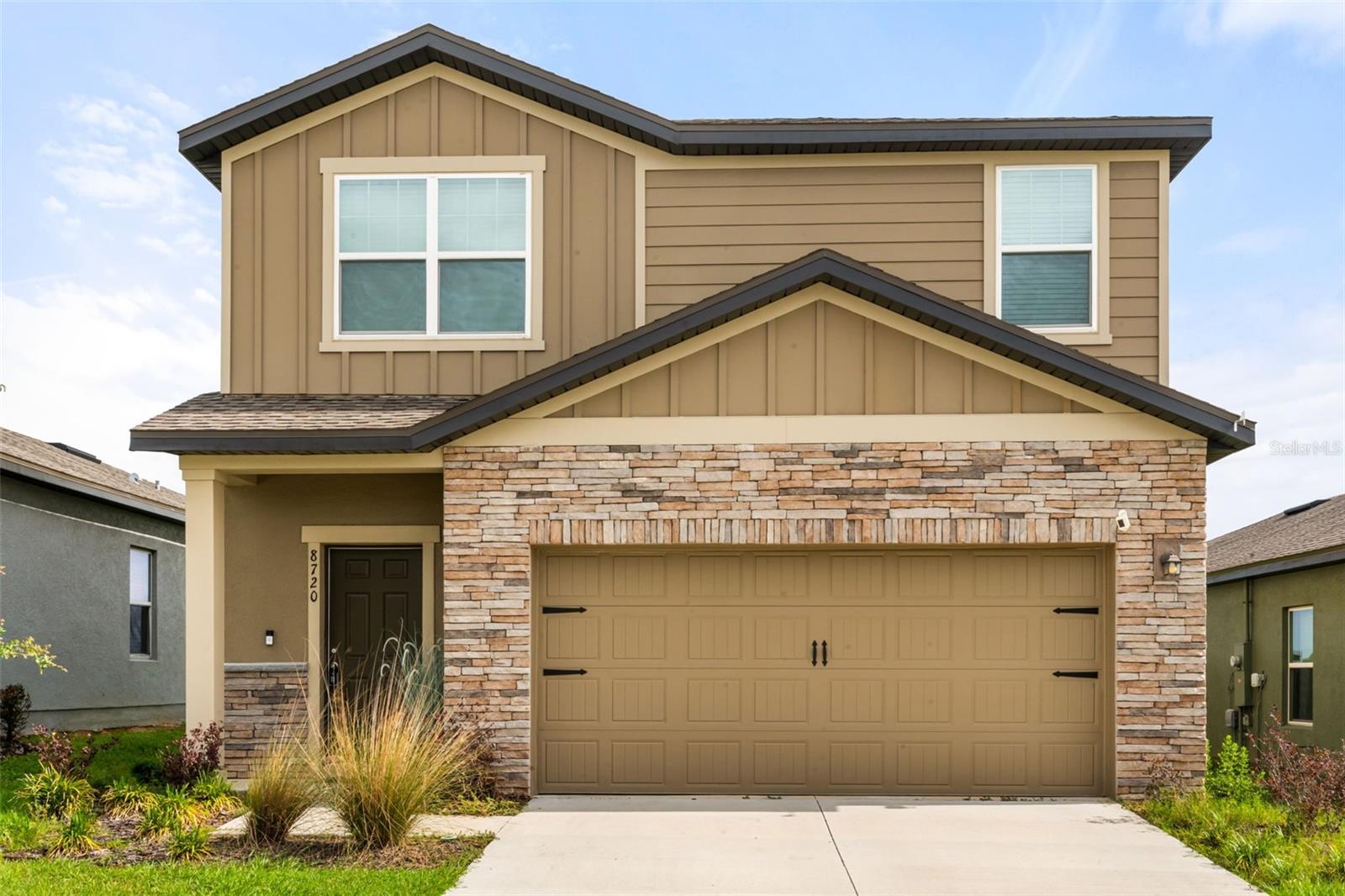 *OFFERING $10,000 IN CLOSING COST ASSISTANCE!* Welcome to the perfect starter home: a stunning 3-bedroom, 2.5-bath, 2-car garage, move in ready beauty, tucked away in the intimate Phillips Landing community, surrounded by a nearly rural area that’s still minutes away from everything. Step inside to a bright, open-concept living and dining space featuring a bold slatted accent wall, recessed lighting, and seamless flow into a gorgeous kitchen boasting white shaker cabinets, granite countertops, stainless steel appliances, generous pantry and under stairs storage. Upstairs, the spacious primary suite offers plush carpet, a large walk-in closet, and a private ensuite bath. Two additional generously sized bedrooms (each with spacious closets) share a well-appointed full bath. A dedicated laundry room with full-size washer and dryer completes the upper level. In the spacious backyard, enjoy ultimate privacy on your patio overlooking a serene retention pond — no rear neighbors, ever. Just waiting for your personal touch to transform it into a peaceful Florida retreat. Commuters rejoice — the Florida Turnpike, US Hwy 27, and SR 19 are all just minutes away, putting Orlando, shopping, and dining within easy reach. Publix and Target are nearby, and Orlando Health South Lake Hospital is just 15 minutes away. Families will love being zoned for Groveland Elementary, Gray Middle, and South Lake High School, with Cherry Lake Preparatory Academy and Mascotte Charter School also nearby. Built only 3 years ago and featuring a structural warranty for added peace of mind. Better than new construction, there’s no wait and it’s ready to move in today!