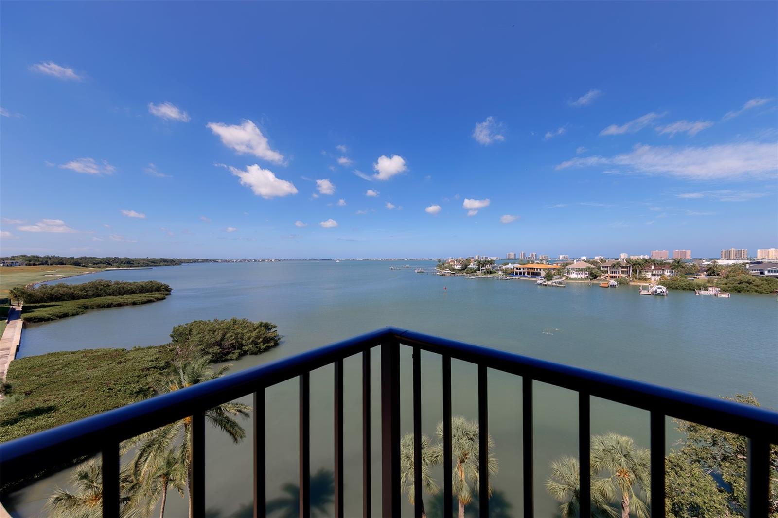You MUST see this video! Step inside and experience this stunning waterfront end unit, where unmatched views and natural light create an inviting and serene atmosphere. Nestled within the exclusive Belleview community, this residence offers a rare opportunity to live alongside the historic Belleview Inn and the prestigious Belleair Country Club. Residents enjoy the unique advantage of immediate access to both Golf and Social Memberships—no wait list required—unlocking a full suite of world-class amenities. This beautifully appointed two-bedroom, two-bath home features two separate living areas, providing both comfort and flexibility for entertaining or relaxing. Throughout the unit, elegant porcelain tile flooring enhances the modern aesthetic, while terrazzo countertops with crushed abalone shells adds a distinctive coastal touch. Two spacious balconies offer breathtaking sunsets and outdoor space for optimal relaxation. Additional highlights include hurricane-grade windows for peace of mind, stainless steel appliances, and a full-size washer and dryer—everything designed for effortless, upscale living. Please note: South Garden 8, Belleview Biltmore Villas, has completed the Milestone project as required by Florida statutes. A major renovation and safety upgrade at all levels was undertaken in 2024 -25 making SG 8 unique among mid-rise condo buildings. A financially strong and elegant residential property is now prepared for the next generation.