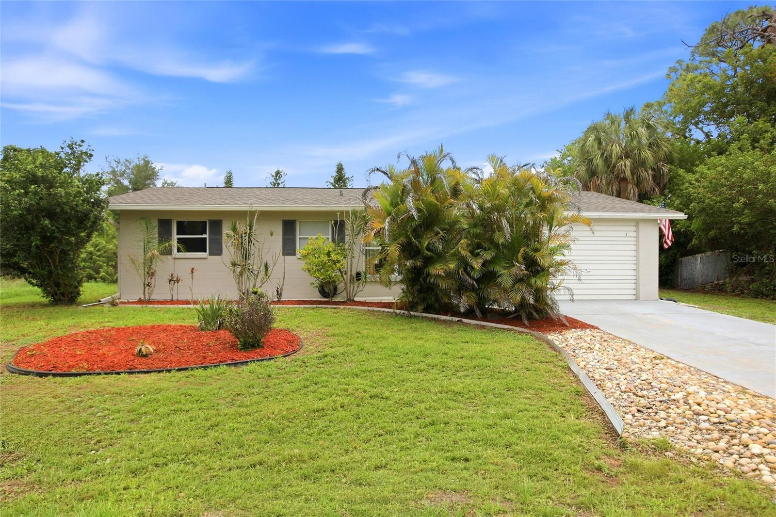 This charming 2-bedroom, 2-bathroom home offers comfort, convenience, and great value in a desirable North Port location on Granada Blvd, just minutes from the famous Warm Mineral Springs. The home features an attached garage and a new roof, providing peace of mind for years to come. Inside, a fresh, neutral paint palette creates a bright, calming atmosphere that's ready for your personal touch. The kitchen stands out with a stylish new accent backsplash, while partial flooring updates give the entire home a sleek, contemporary feel. The layout offers a functional and inviting living space, ideal for both full-time residents and seasonal homeowners. Step outside to enjoy a fenced-in backyard, perfect for pets, outdoor entertaining, or simply relaxing in your own private retreat. The property also features low-maintenance landscaping and a spacious driveway for additional parking. Ideally located near the US-41 corridor, I-75, and just a short drive to beautiful Gulf Coast beaches, this home provides easy access to shopping, dining, parks, and everyday conveniences while still offering a peaceful neighborhood setting. Don’t miss the opportunity to own a well-maintained home in a growing area of North Port!