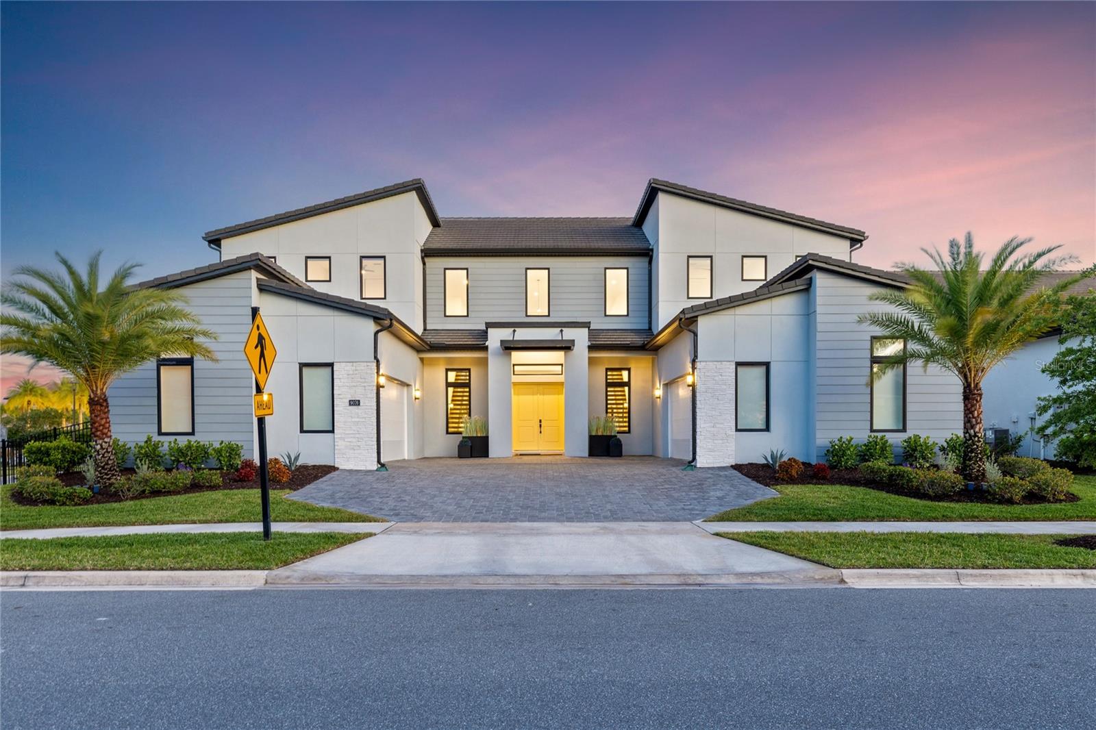 One or more photo(s) has been virtually staged. Soaring 24-foot ceilings, dual floating staircases, and a 57-foot private lap pool—this is not your typical Lake Nona home.

Experience the perfect blend of luxury, functionality, and family living in this exceptional Toll Brothers residence, ideally positioned on a premium corner lot within the gated Laurel Pointe community in Lake Nona, with convenient access to Luminary Elementary and Middle School.

From the moment you enter, the home makes a lasting impression. The 24-foot ceilings and dual custom floating staircases create a dramatic architectural focal point, while expansive dual-pane windows fill the space with natural light and enhance energy efficiency and comfort. Thoughtfully designed for both everyday living and entertaining, the open-concept layout offers a seamless flow between the main living, dining, and kitchen areas.

At the heart of the home, the chef’s kitchen blends performance with design, featuring a 48” Sub-Zero Pro glass-door refrigerator, expansive 10-foot island, custom tile backsplash, built-in wine and beverage refrigeration, and designer alabaster pendant lighting. An oversized walk-in pantry provides exceptional storage while maintaining a clean, functional layout.

Built for long-term quality, the home offers concrete construction on both levels with gypcrete between floors, delivering enhanced durability and sound insulation. Additional features include whisper-quiet Koa wood ceiling fans, app-controlled pool systems, and Cat-6 hardwired connectivity for modern convenience.

Step outside to a private, resort-style retreat centered around a custom 57-foot saltwater lap pool with heating and cooling capabilities. Marble decking, a pergola with integrated ceiling fans, swim-out benches, and a full two-story screened enclosure create an outdoor space designed for both relaxation and entertaining, with a gas line already in place for a future summer kitchen and perimeter hedging for added privacy.

The primary suite offers a true retreat with dual walk-in closets and a spa-inspired bath featuring an extended walk-in shower with drying area and a soaking tub. Additional upgrades include luxury vinyl plank flooring throughout, motorized window shades, floor-to-ceiling tiled bathrooms, a whole-house 7-stage water filtration system, and dual tankless water heaters.

Two separate insulated 2-car garages provide a full 4-car capacity, including one fully climate-controlled and humidity-regulated with 240V power, ideal for EV charging, a home gym, workspace, or premium vehicle storage.


Located within a gated Toll Brothers enclave of just 124 homes, in the heart of Lake Nona’s innovation district, this home offers convenient access to Medical City, the VA Hospital, Nemours, Town Center, and top-rated schools. Just 15 minutes from Orlando International Airport and the USTA National Campus, with easy access to major highways, theme parks, and Florida’s renowned beaches. The area continues to grow with the upcoming AdventHealth hospital and the Lake Nona West development, along with additional conveniences such as Sprouts Farmers Market—delivering a rare combination of elevated design, connectivity, and long-term lifestyle value in one of Central Florida’s most desirable communities.