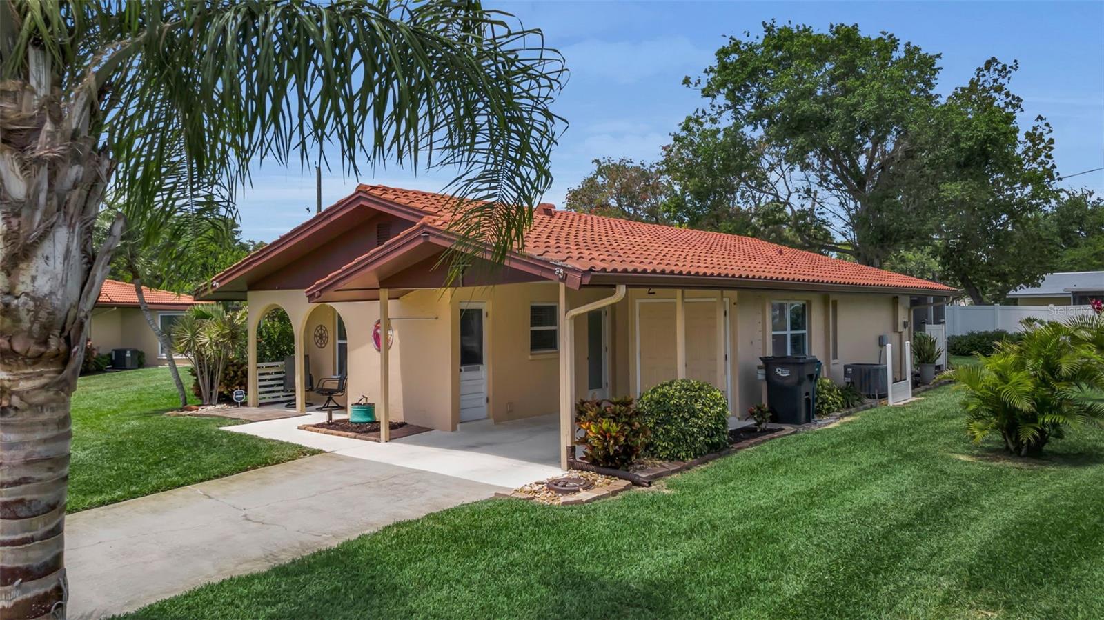 This Cambridge Village remodeled stand alone villa has a NEW warranted air conditioner June,2026.  The seller has quotes for a new roof and will replace it or give the credit to the buyer. Quotes are available for review.   The 55+ home is light and bright with additional square footage to provide a third bedroom for visitors.  The unit is being presented fully furnished for your convenience. 
A survey is available for the owners to see that it is an oversized lot. A survey is available with the unit.  This allows for privacy and plenty of room for gardening. 
There is an active Community Center with both heat for the pool in the winter and a cooling agent for the pool in the heat of the summer. 
This location is just miles from the hub of Sarasota and approx. 8 miles to the beaches, 6 miles to the Sarasota Airport , 11 miles to UTC, 10 miles to St. Armands Circle. There is plenty of shopping available including the favorite Detweiler's Farm Market and the newly remodeled Publix 1.5 miles away. LOW MAINTENANCE FEE!!!!!!!!!!