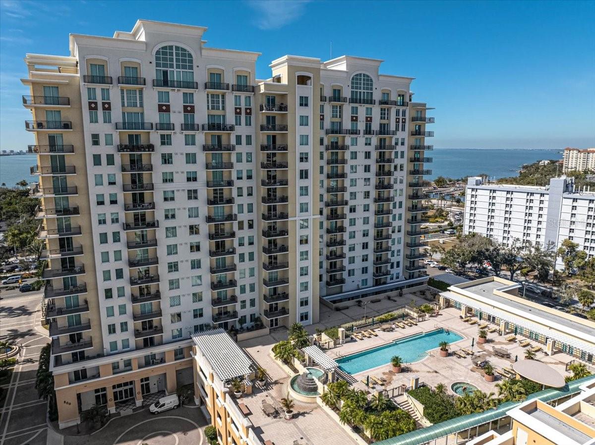 Live the Downtown Sarasota lifestyle in this turnkey furnished 2-bedroom, 2-bath condominium located in the highly sought-after Alinari Condominium Community. Perfectly positioned in the near the heart of the city, this residence offers sweeping city and pool views from a private balcony, creating an ideal backdrop for both daily living and entertaining.

The open-concept floor plan is light and bright, featuring a well-appointed kitchen, spacious living and dining areas, and a split-bedroom layout for added privacy. Hurricane impact windows and sliding doors provide added peace of mind while enhancing energy efficiency and noise reduction. Offered turnkey furnished, this condo is truly move-in ready, making it ideal as a primary residence, second home, or investment property.

Alinari is known for its luxury high-rise living, pet-friendly environment, and socially active community, offering frequent opportunities to connect with neighbors and enjoy an engaging lifestyle. Resort-style amenities include a heated swimming pool and spa, state-of-the-art fitness center, sauna, wine storage, social room, and theater room. Residents enjoy 24-hour security and concierge services, providing comfort, convenience, and peace of mind.

Located just steps from downtown Sarasota, you are minutes from Main Street, Marina Jack, Bayfront Park, Selby Gardens, world-class dining, shopping, arts, and entertainment. Sarasota’s renowned beaches, including Lido Beach and Siesta Key Beach, are only a short drive away.

Whether you’re seeking a luxury downtown condo, a turnkey Sarasota residence, or a low-maintenance lifestyle close to it all, this Alinari condo delivers exceptional value and location. Private showing available!