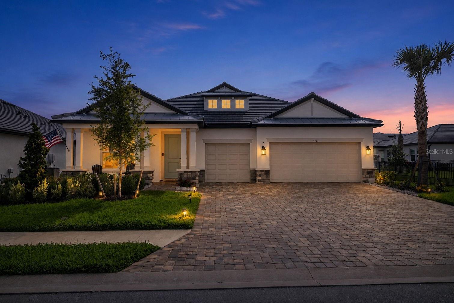Situated in the highly sought after community of Lakewood Ranch, this award winning Crystal floor plan offers an exceptional blend of elegance, comfort, and modern Florida living with tranquil lake views, stunning natural light, and thoughtfully selected upgrades throughout. Spanning 2,314 square feet, this beautifully designed residence features three bedrooms, three full bathrooms, a private den, and a spacious three car garage.

From the moment you step through the front door, the home welcomes you with an open and airy layout designed for both everyday living and entertaining. Near the entrance, a private guest bedroom paired with a full bath creates the perfect retreat for visitors, while the adjacent den offers flexibility for a home office, media room, or additional lounge space. The front guest bedroom is filled with beautiful sunset lighting that creates a warm and inviting atmosphere throughout the afternoon and evening.

As you move into the heart of the home, the expansive great room, dining area, and kitchen seamlessly come together while showcasing breathtaking lake views and beautiful sunrise light pouring through the windows each morning. Designed for both style and function, the kitchen features a stylish backsplash, gas cooktop, GE oven and microwave, and a premium KitchenAid refrigerator with a striking dark interior finish. The oversized island and abundant counter space make the kitchen ideal for entertaining or everyday culinary adventures.

Privately positioned at the rear of the home, the owner’s suite offers peaceful lake views and stunning sunrise mornings directly from the bedroom. The spacious walk in closet includes a custom closet system, while the spa inspired owner’s bath features dual sinks, a large open style walk in shower, and a private water closet designed for comfort and relaxation.

The screened lanai creates an exceptional indoor outdoor living experience, enhanced with an upgraded fine mesh screen enclosure designed to minimize bugs while still allowing unobstructed lake views. A dedicated hidden corridor within the screen enclosure provides a clean solution for extension cords and cable management, adding both convenience and functionality.

Additional upgrades throughout the property include an epoxy finished garage floor and a premium Aquasure 48,000 grain water softener and carbon filtration system that helps remove chlorine from the water supply. The entire system is discreetly housed inside a separate storage shed, preserving the clean appearance of the home’s exterior. Furnishings are negotiable for added convenience. 

Beyond the exceptional features of the home itself, residents of Sweetwater at Lakewood Ranch enjoy access to an impressive collection of resort style amenities designed to complement an active and social lifestyle. The community’s beautifully designed amenity center serves as the heart of Sweetwater, featuring a resort style pool with expansive lounging areas, a fully equipped 24 hour fitness center, pickleball courts, a multi purpose sport court, playground, and a vibrant social hall for neighborhood gatherings and events. Residents also enjoy a festival lawn and amphitheater that regularly hosts outdoor movies, community events, and seasonal celebrations, creating a true sense of neighborhood connection and lifestyle driven living.
